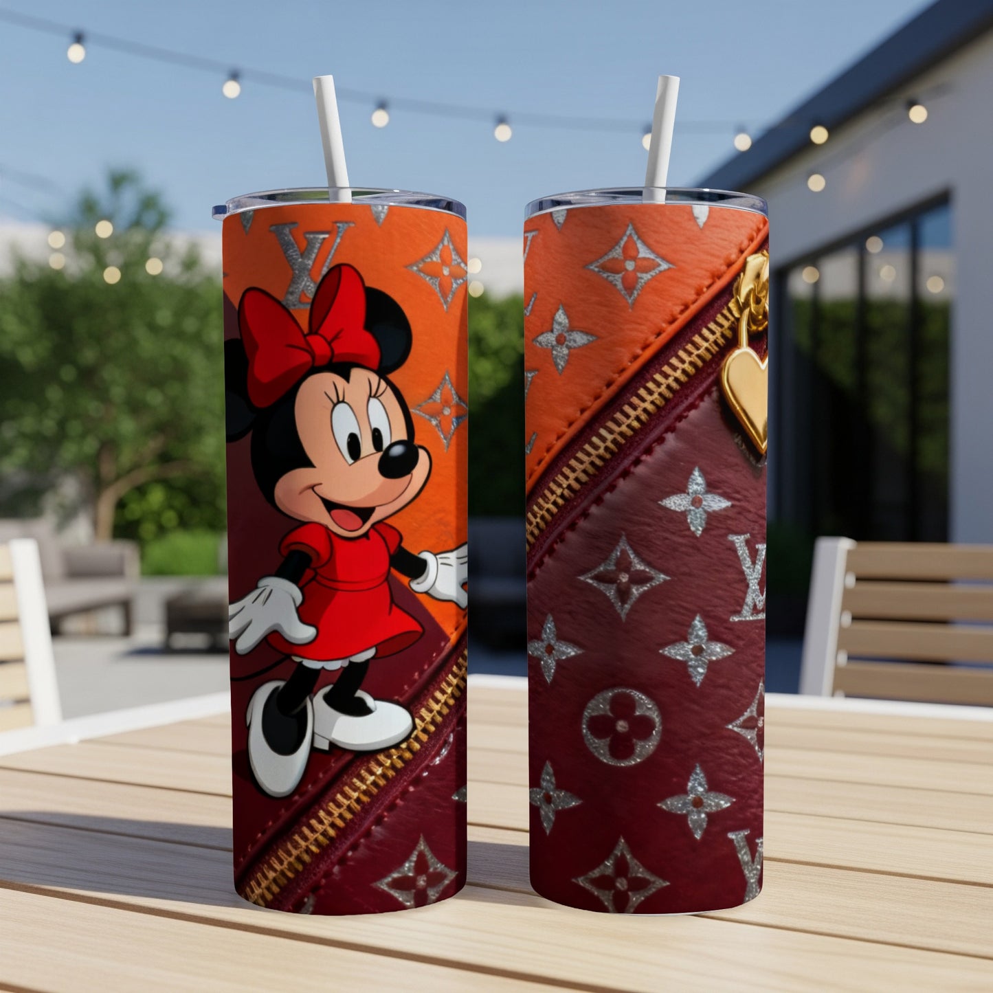 Minnie Mouse on tumbler with Louis Vuitton pattern.