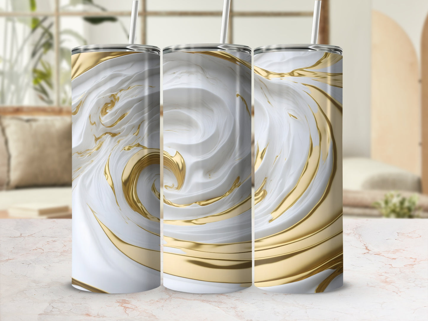 Three white and gold marbled tumblers with straws stand in a row.