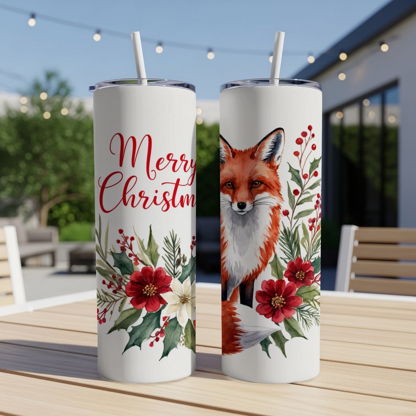 Two tumblers with a fox and floral Christmas design, reading "Merry Christmas."