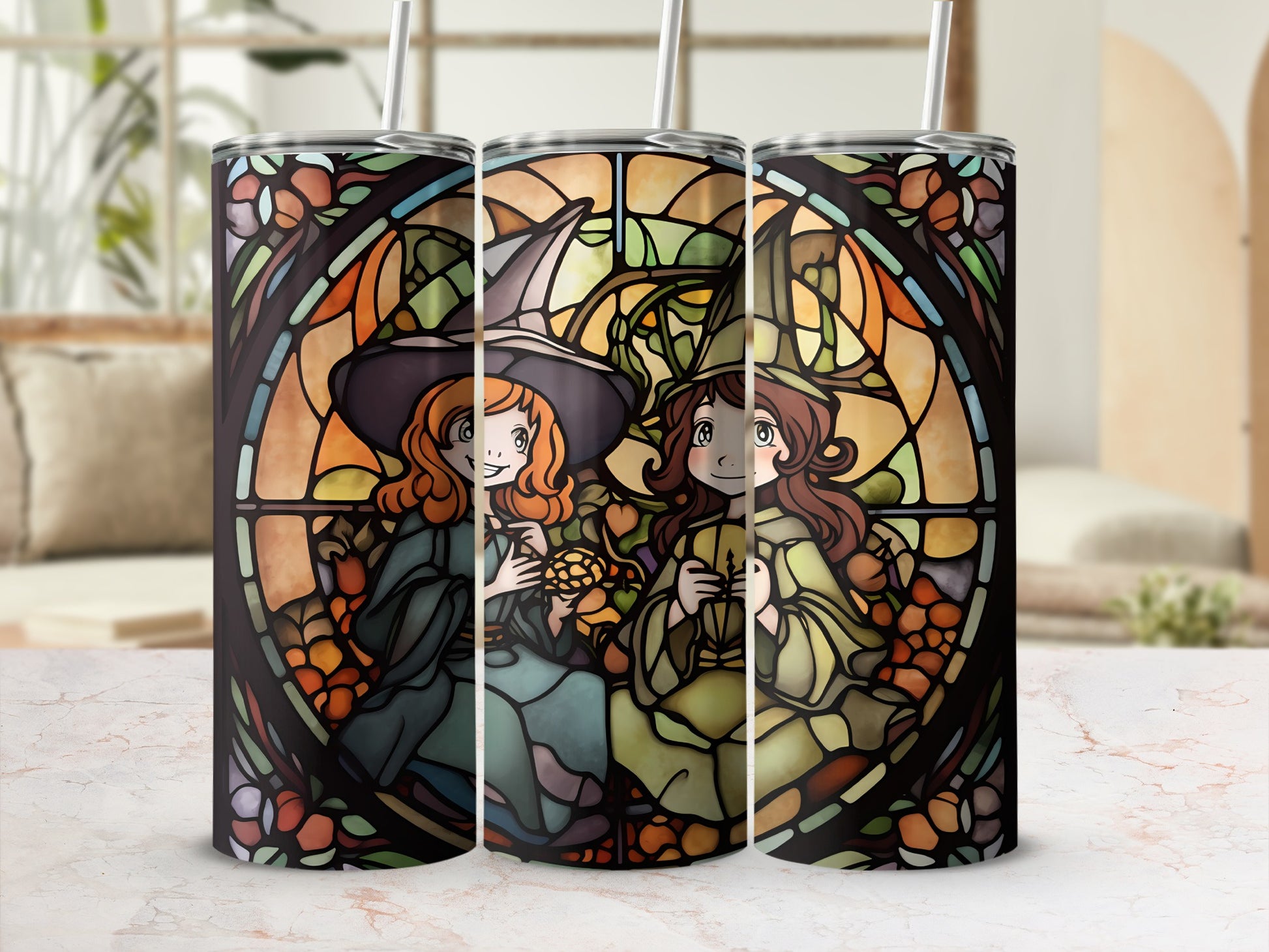 Three stained glass tumblers featuring cartoon witches with orange hats and striped socks.