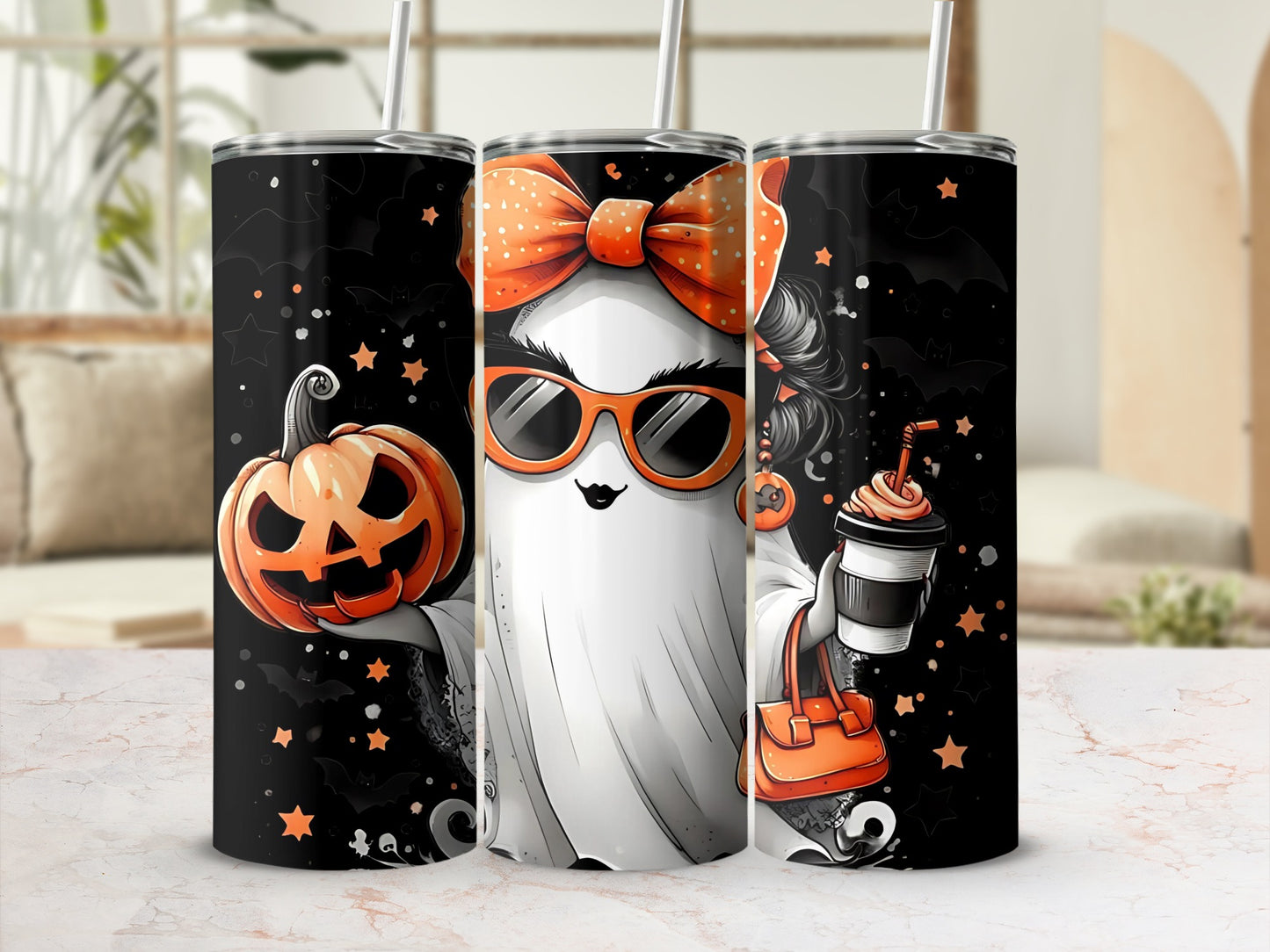 Three tumblers featuring a ghost holding a pumpkin, a ghost with sunglasses, and a ghost with a coffee and purse.