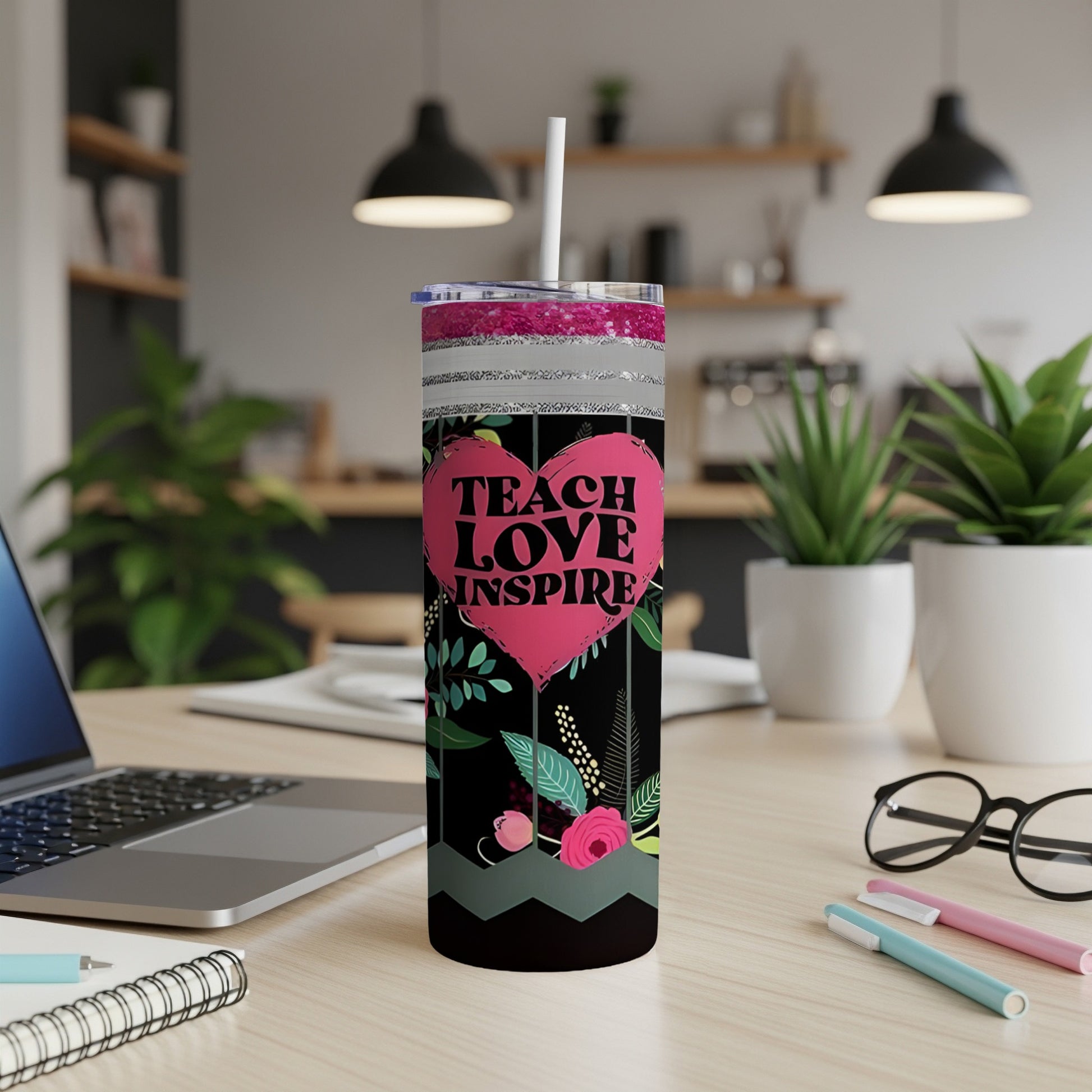 Black tumbler with pink heart and floral design, "TEACH LOVE INSPIRE" text.