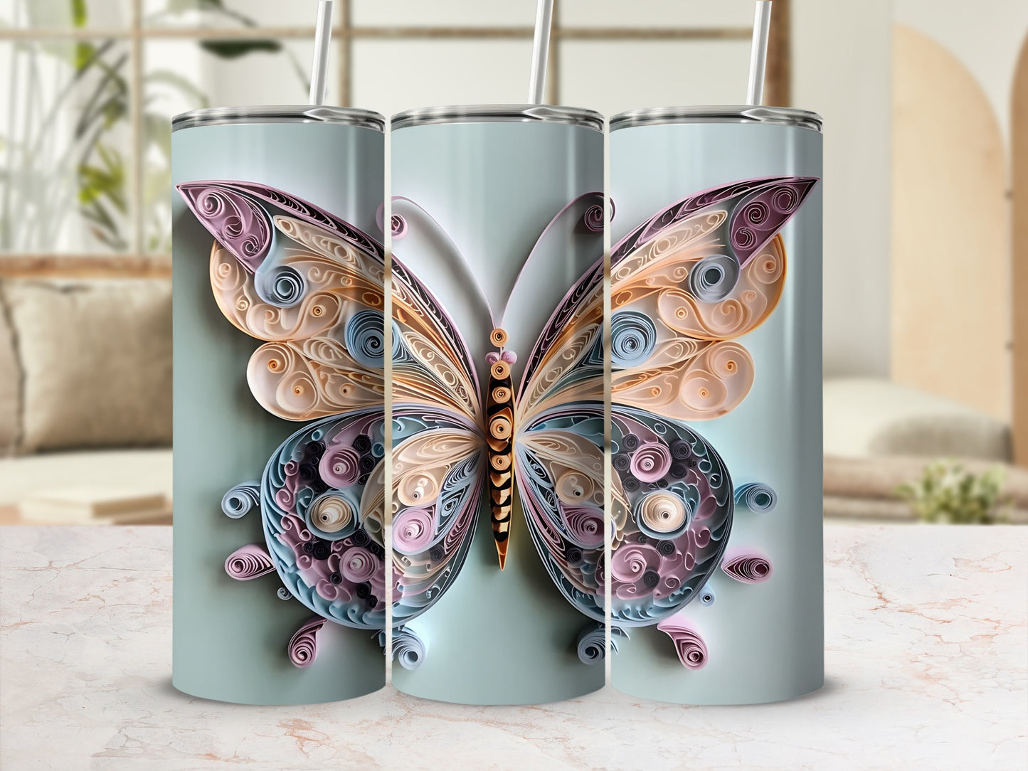 Three tumblers with a pastel quilled butterfly design.