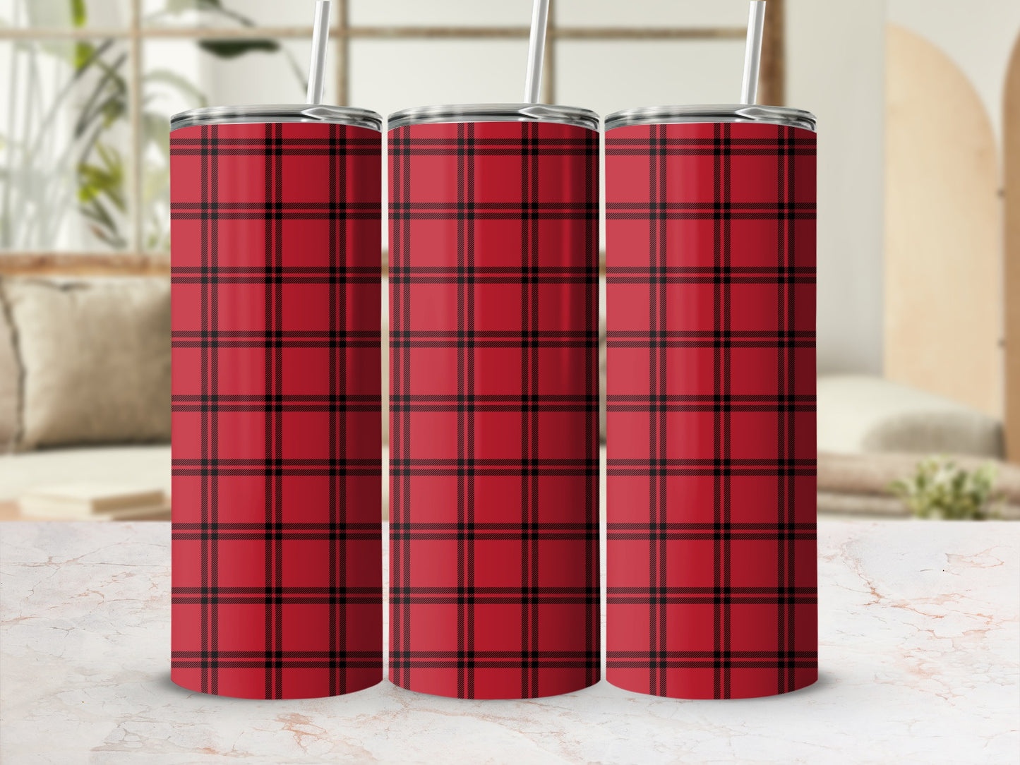 Three tumblers with red and black plaid pattern, each with a straw.