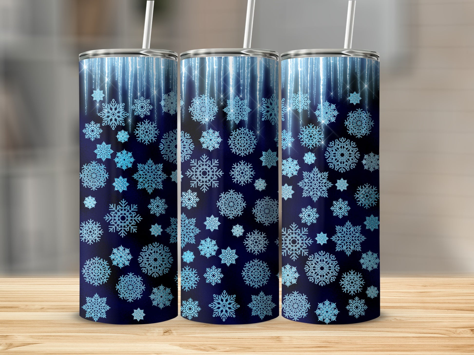 Dark blue tumbler with snowflakes and dripping icicle design.