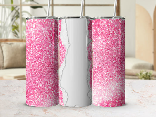 Pink glitter tumbler with a ripped paper effect and straw.