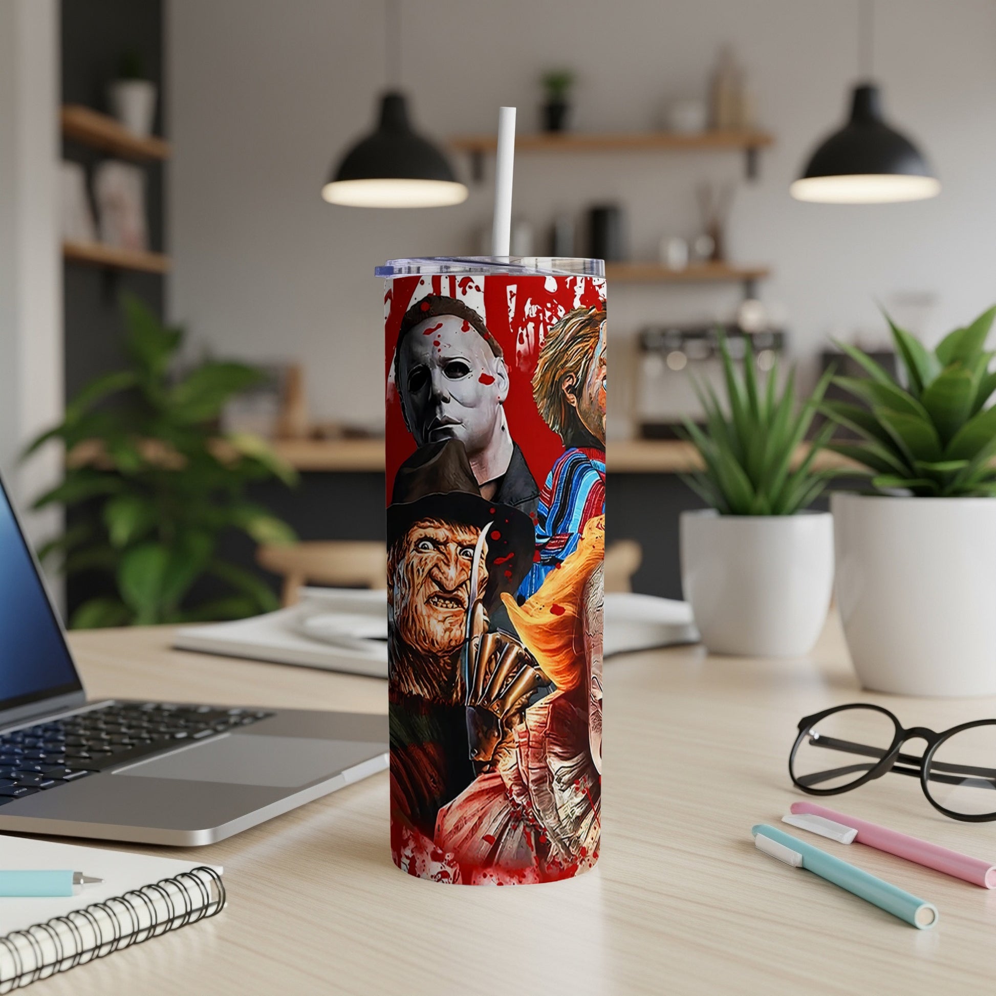 Tumbler with horror movie characters including Freddy Krueger, Michael Myers, Chucky, and Pennywise.
