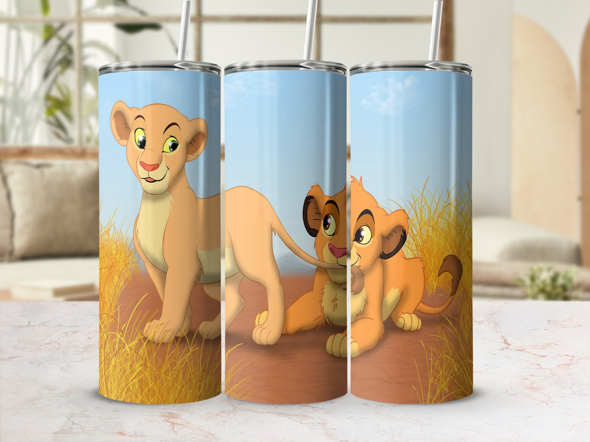 Three Simba and Nala tumblers with cartoon lion cubs in grassy savanna scene.