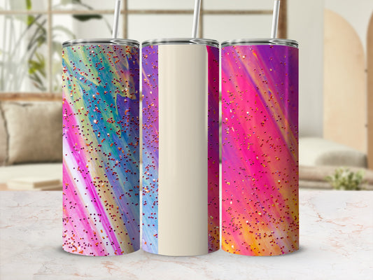 Three tumblers with colorful abstract patterns and glitter.