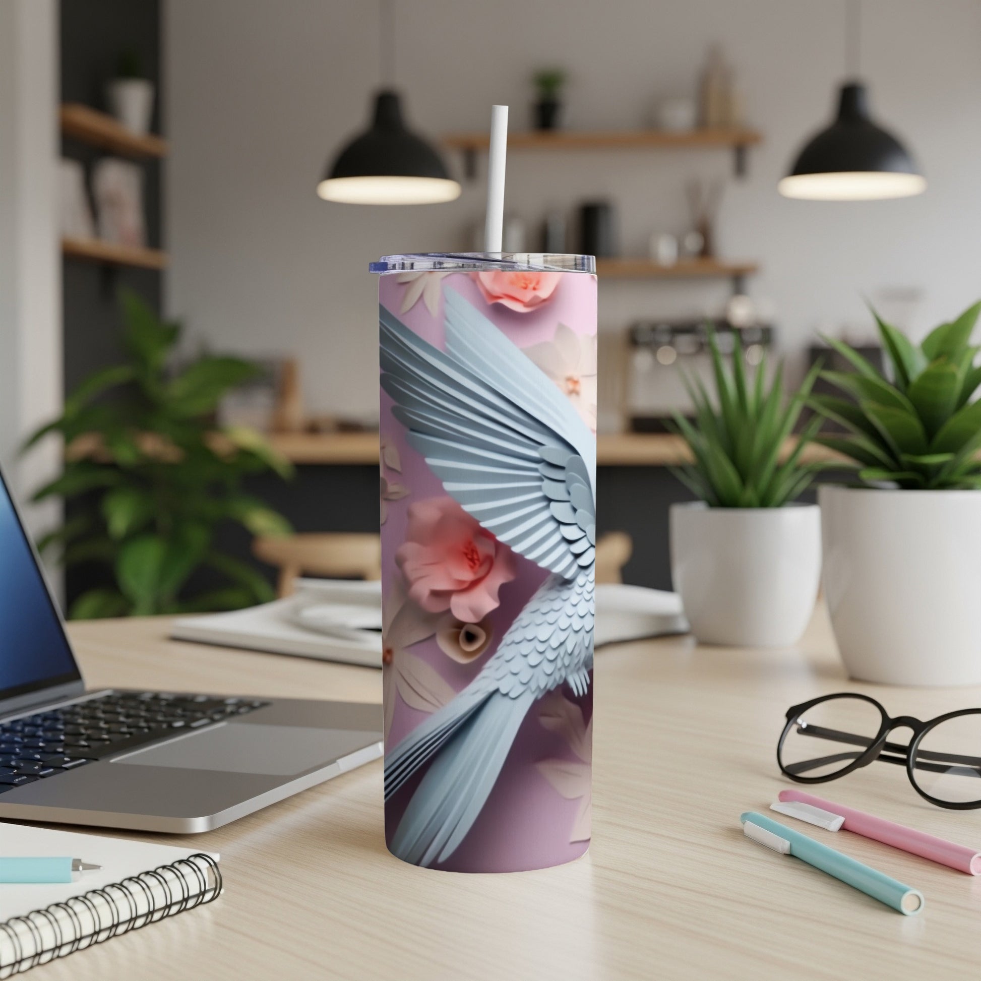 White bird with spread wings on a floral background tumbler.