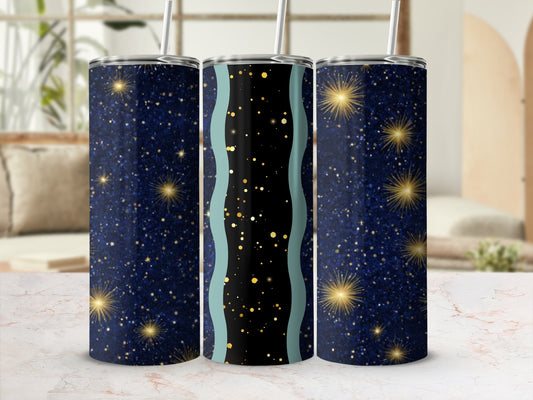 Three starry tumblers with straw, two with dark blue glitter, one with gold accents.