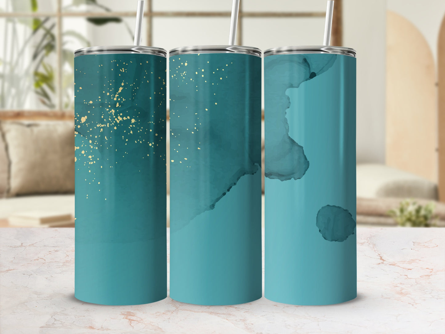 Three teal tumblers with gold speckles and abstract watercolor designs.