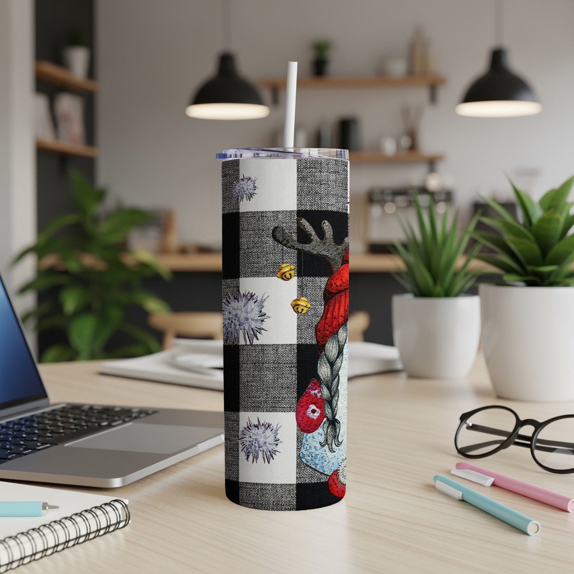 Christmas gnome tumbler with plaid, snowflakes, and reindeer antlers.