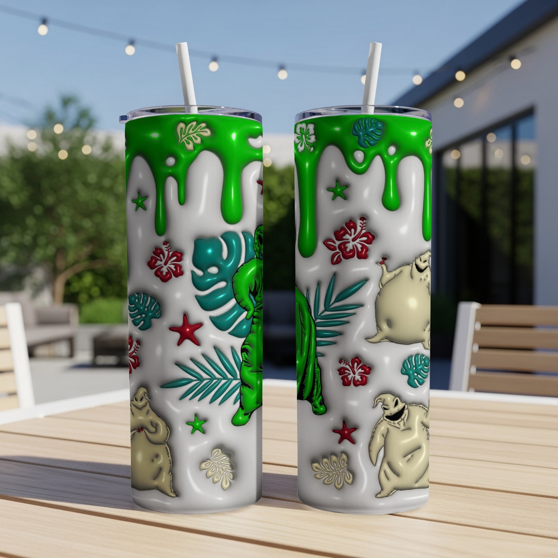 Two white tumblers with Oogie Boogie and tropical leaves design.