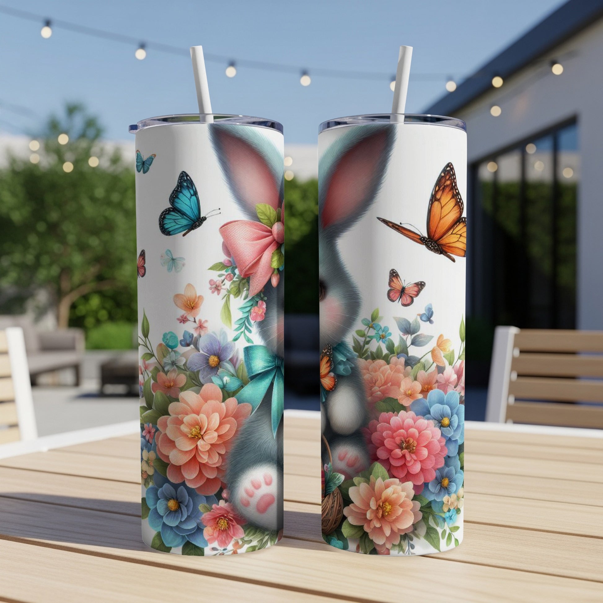 Easter bunny with flowers and butterflies on a tumbler.