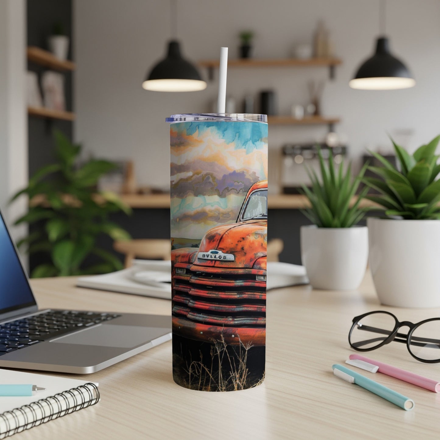 Rustic orange truck with watercolor sky design on a stainless steel tumbler.