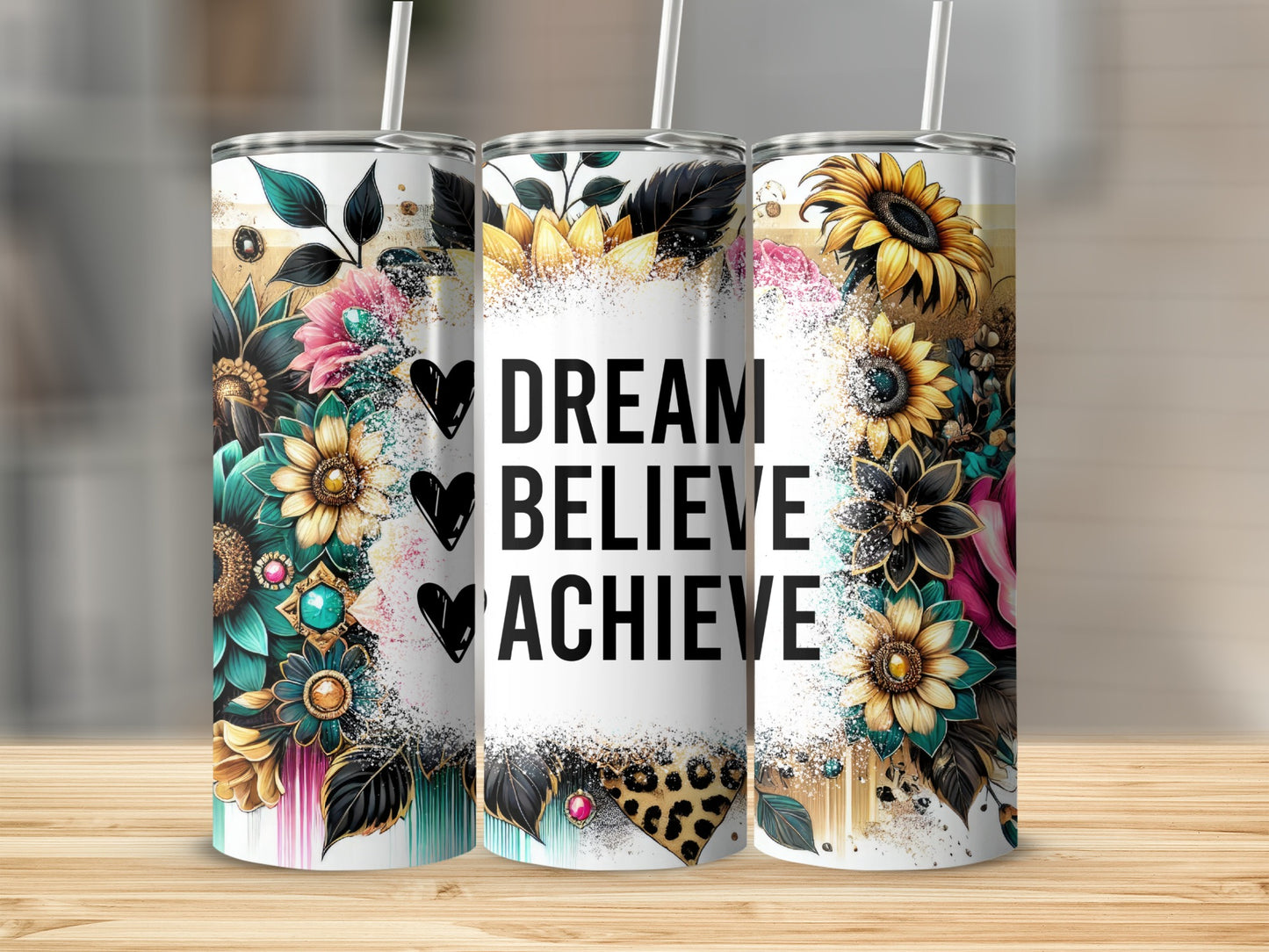 Tumbler with floral accents and "Dream Believe Achieve" text.