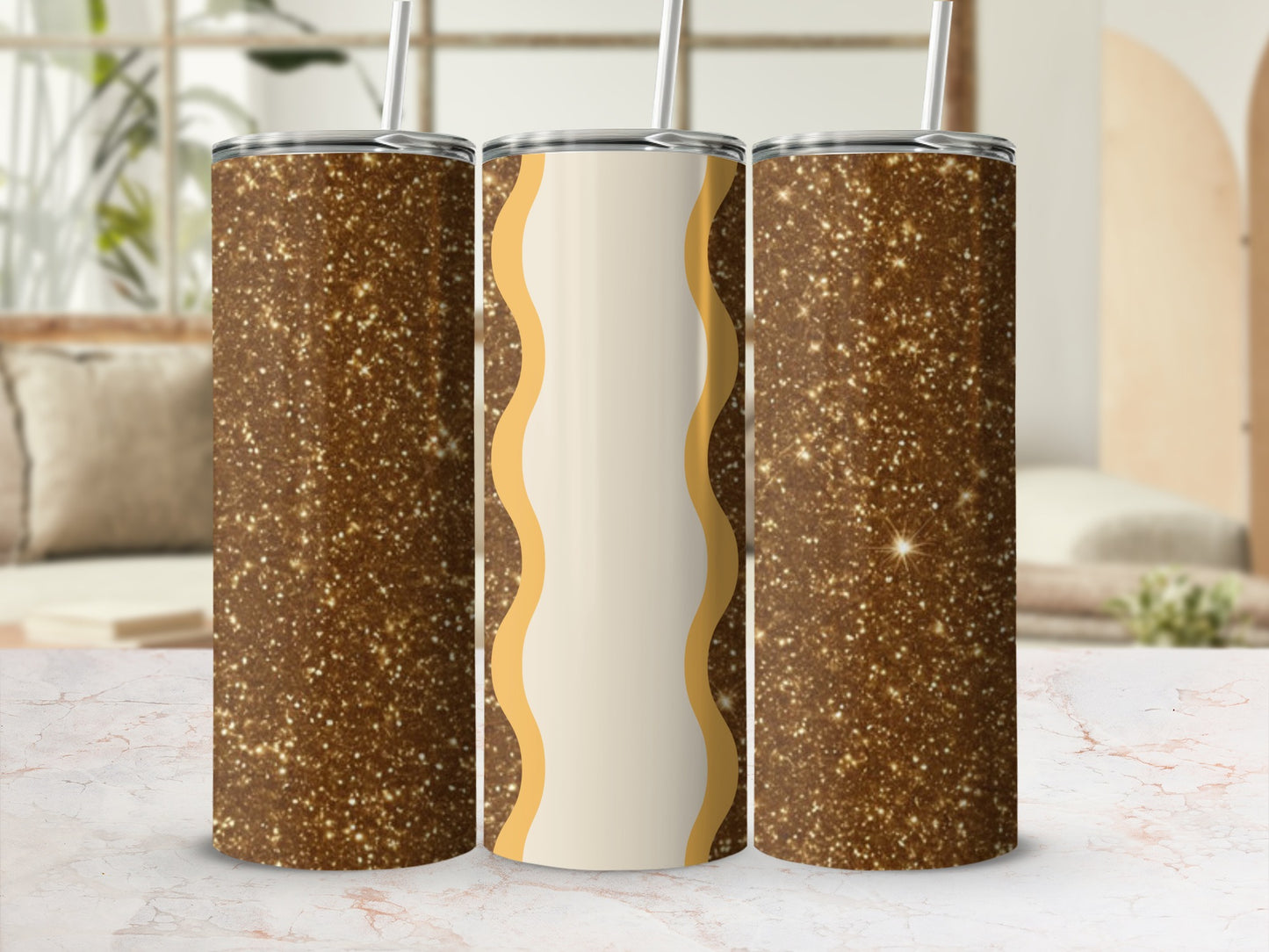 Three tall, skinny tumblers with a speckled gold glitter design.