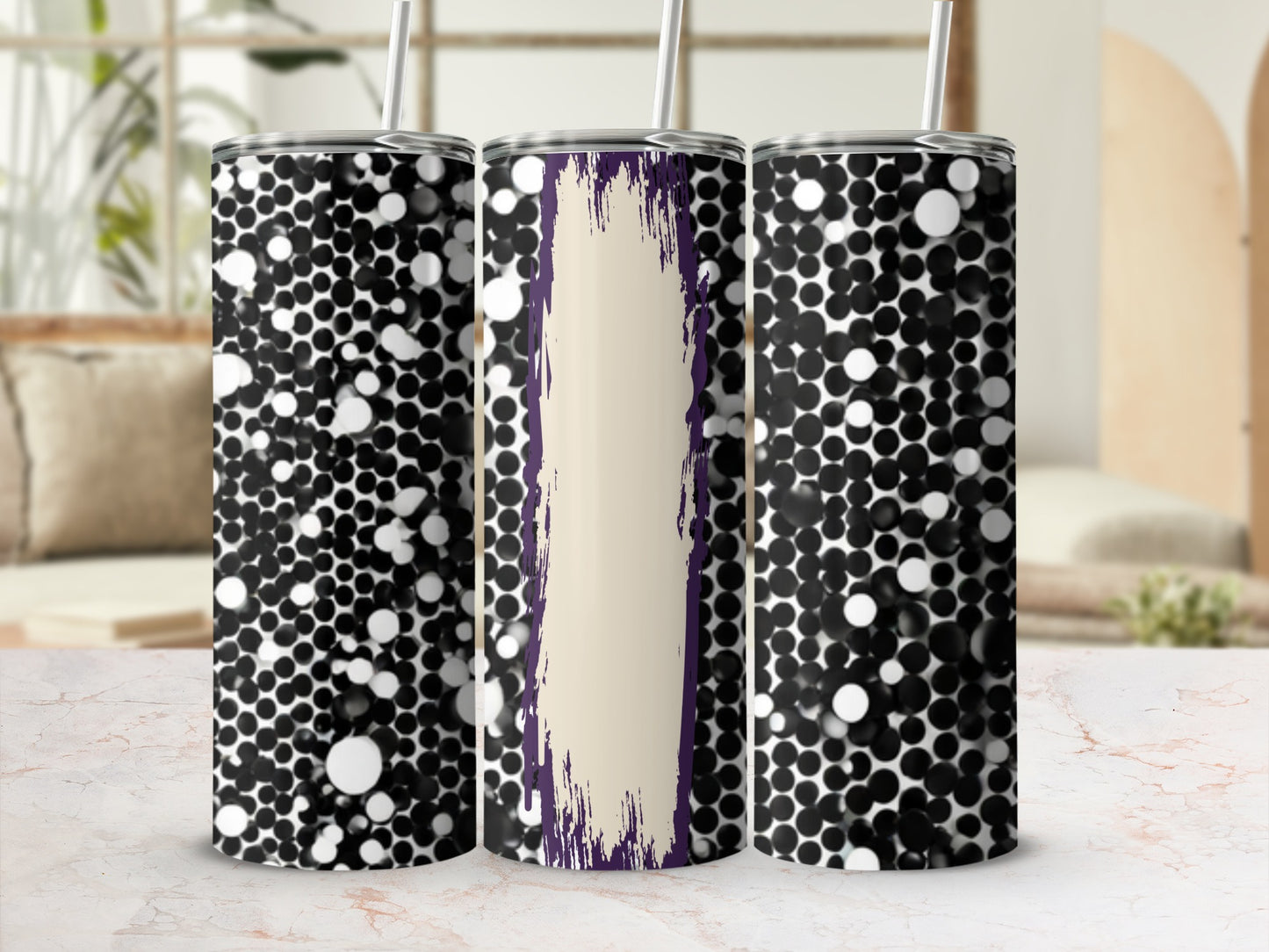 Black and white circles pattern tumbler with purple brushstroke detail.