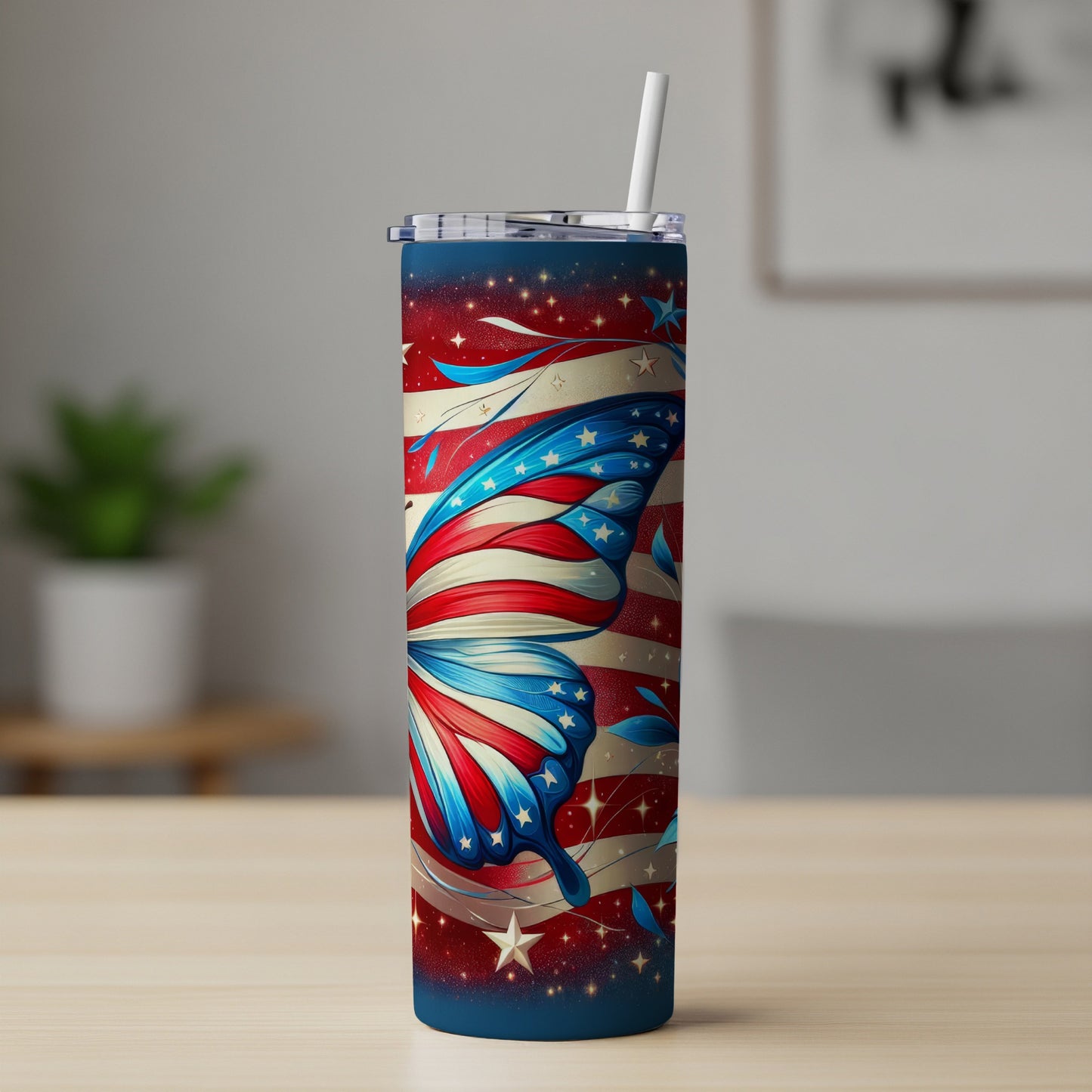 Tall tumbler with butterfly wings featuring red, white, and blue stars and stripes.