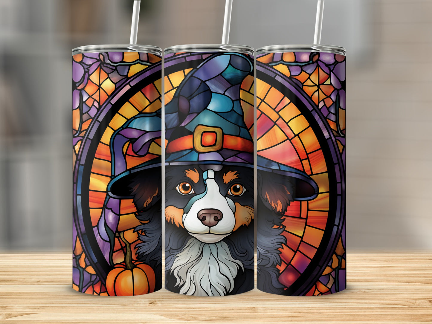 Australian Shepherd dog wearing a witch hat with stained glass background and pumpkin.