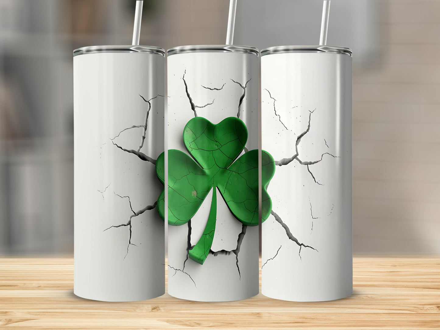 Three white tumblers with cracked design and green shamrock.
