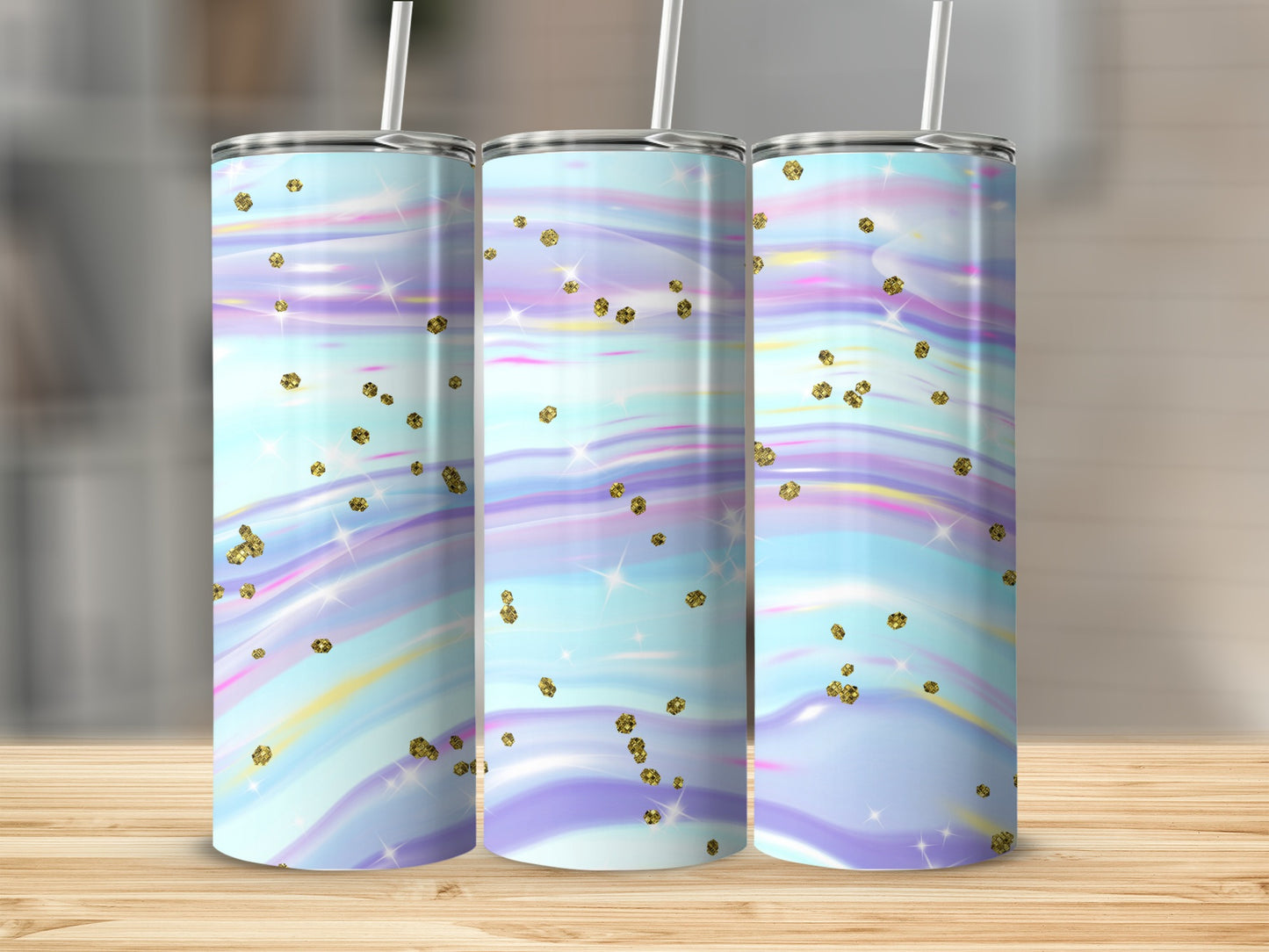 Three tumblers with pastel watercolor swirl patterns and gold glitter accents.