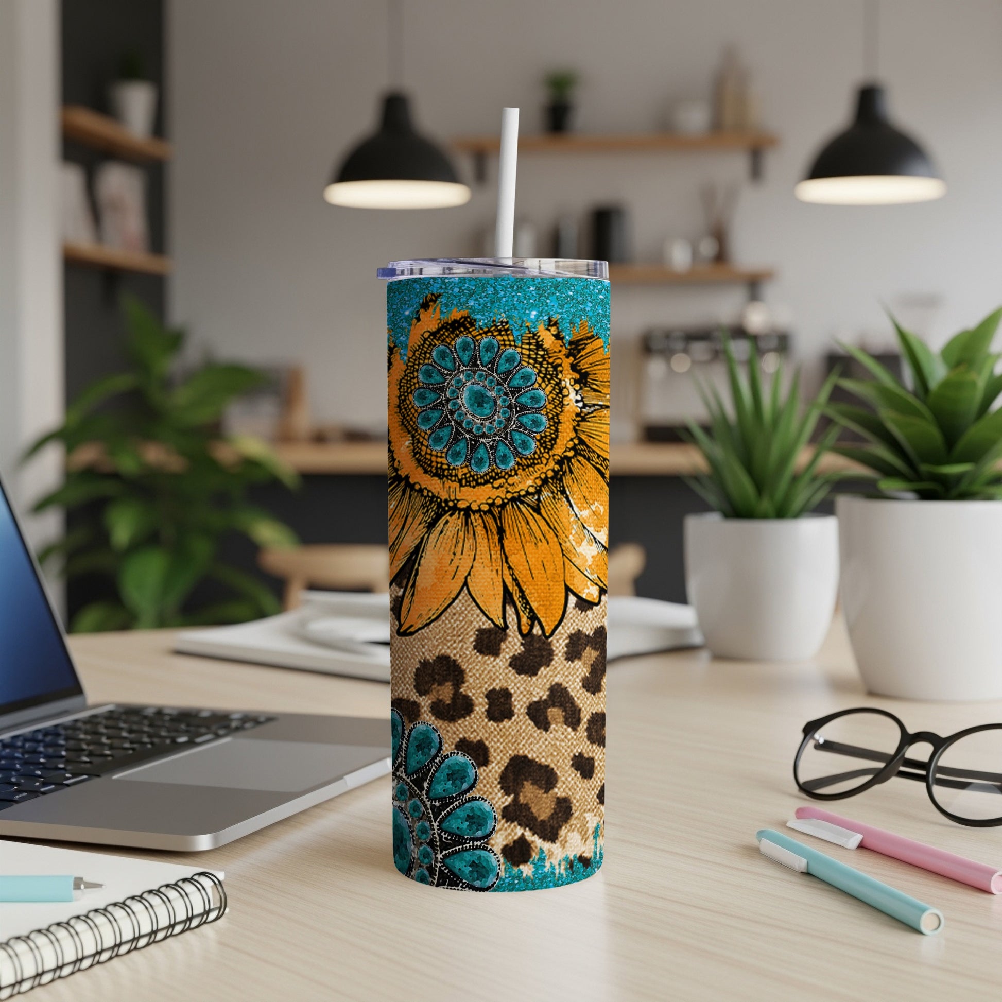 Turquoise and leopard print tumbler with sunflower design.