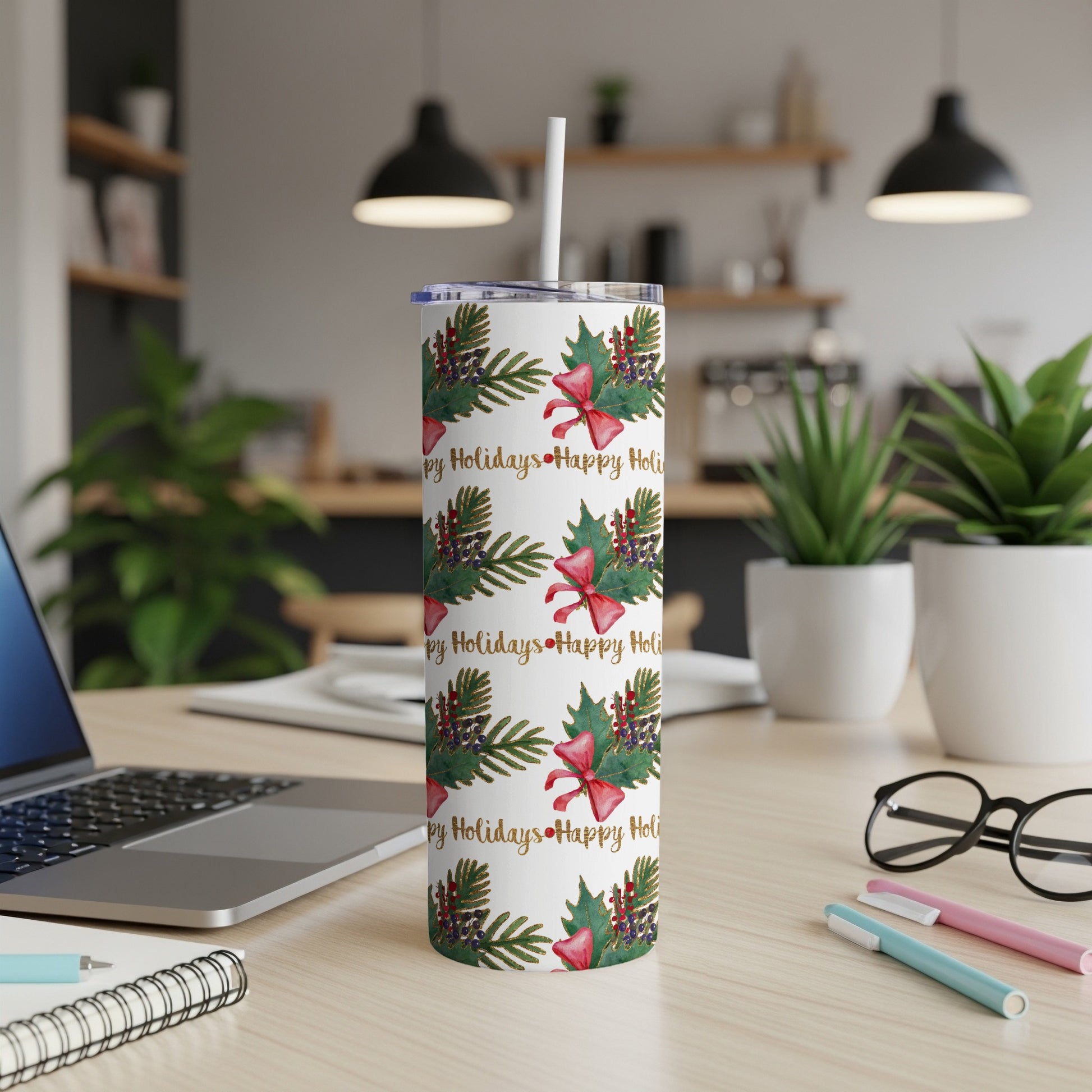 Christmas tumbler with red bows, pine sprigs, and "Happy Holidays" text.