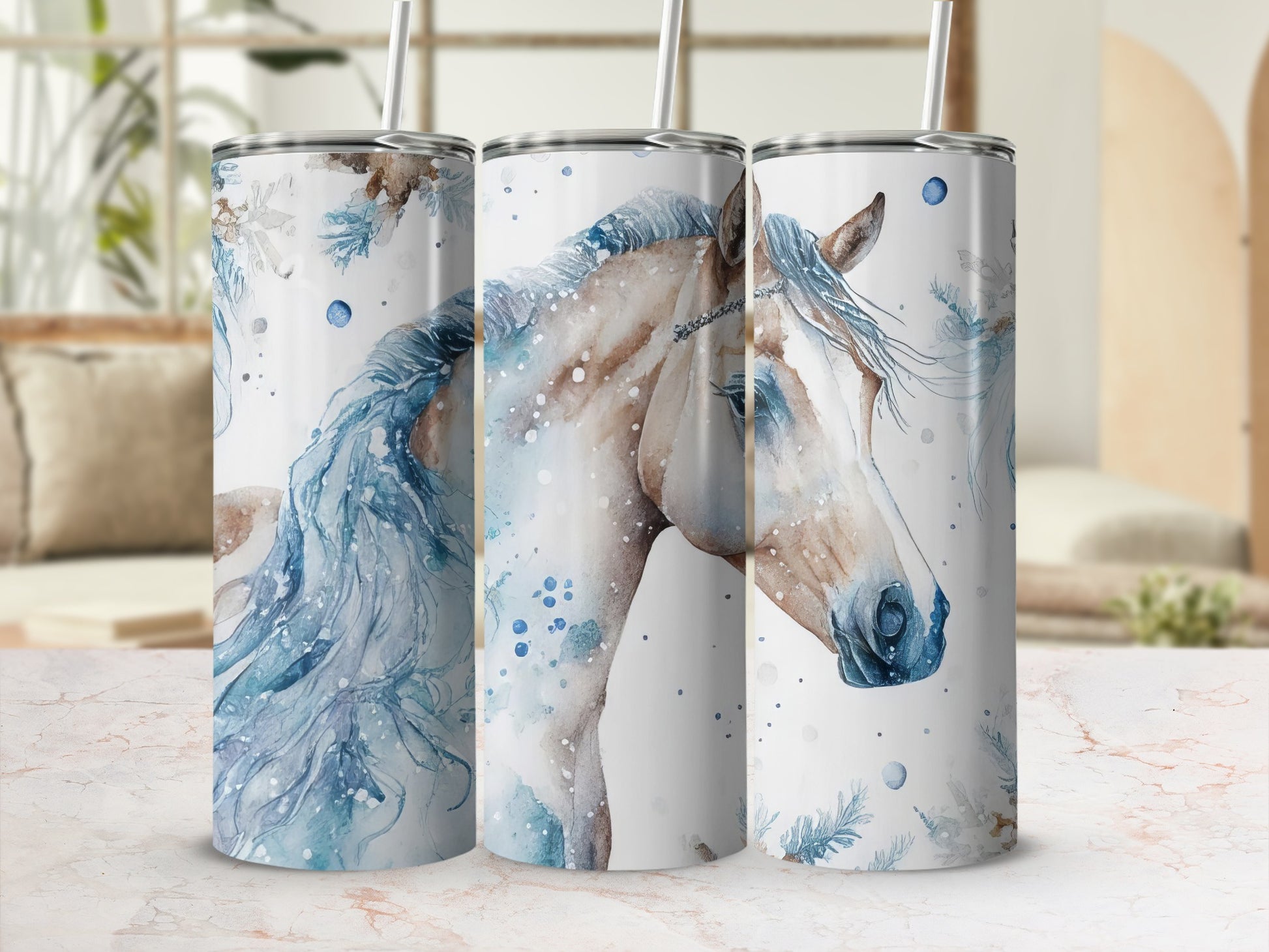 Tumbler featuring a watercolor horse with blue and white floral and snowflake accents.