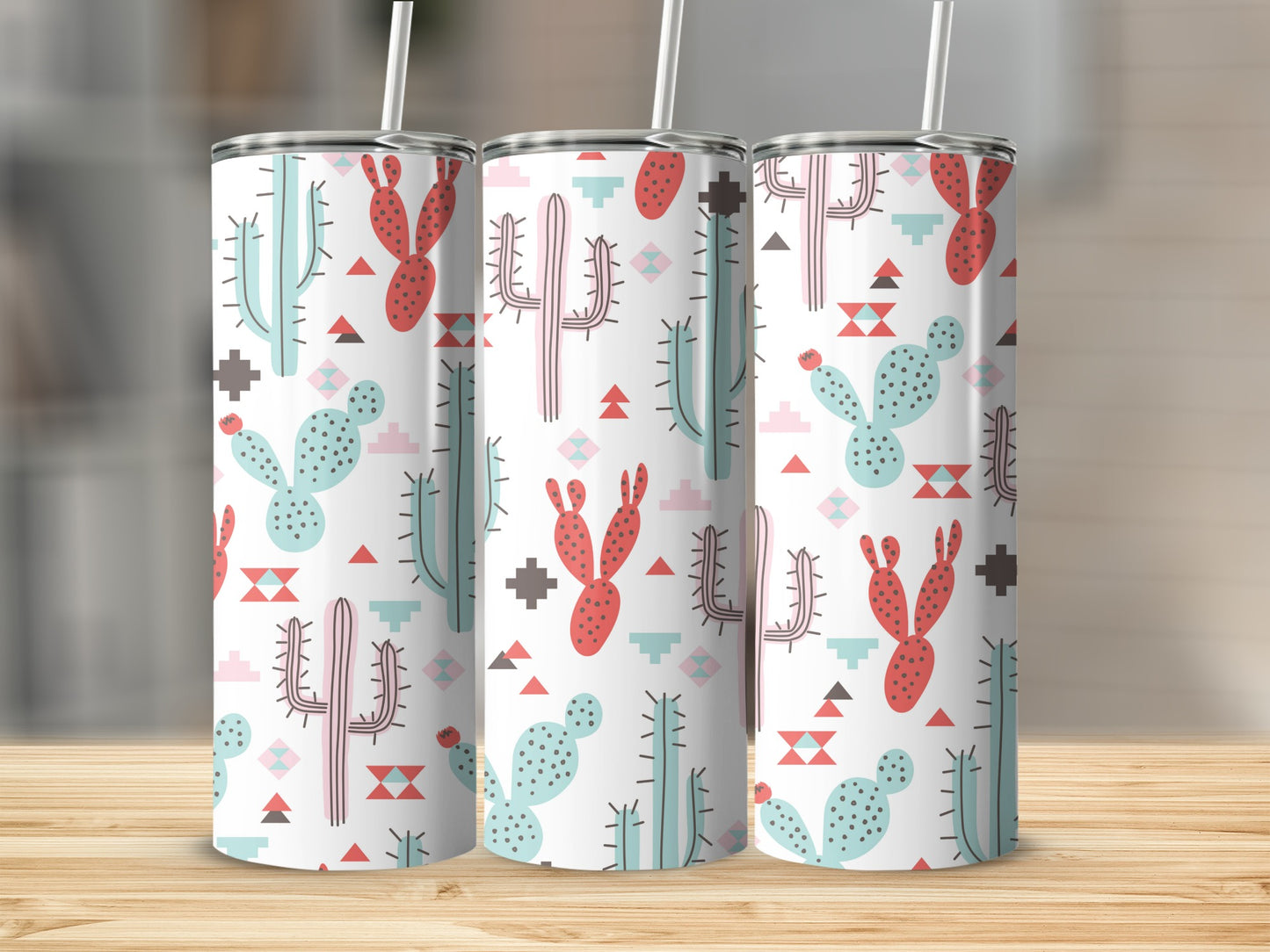 Three tumblers with a white background and a Southwestern cactus pattern.