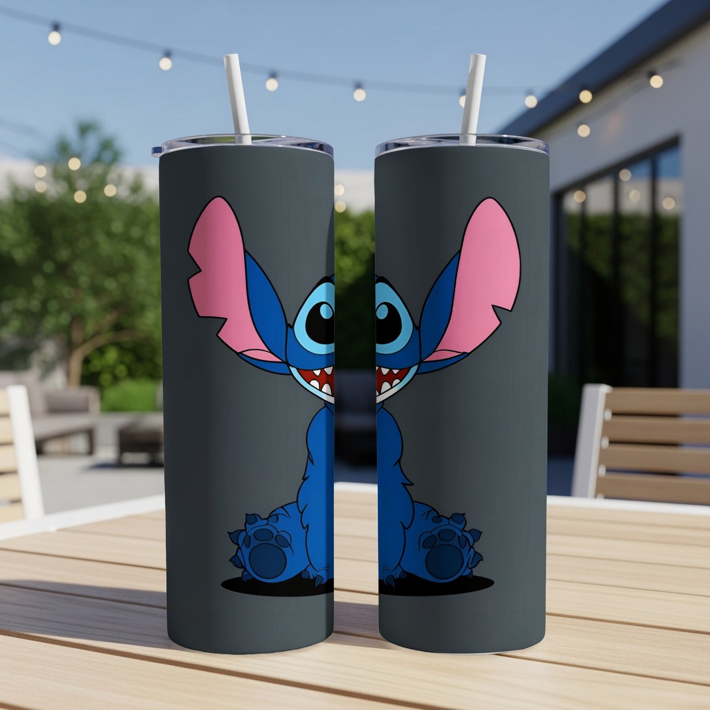 Two dark gray tumblers featuring Stitch with wide open mouth and large ears.