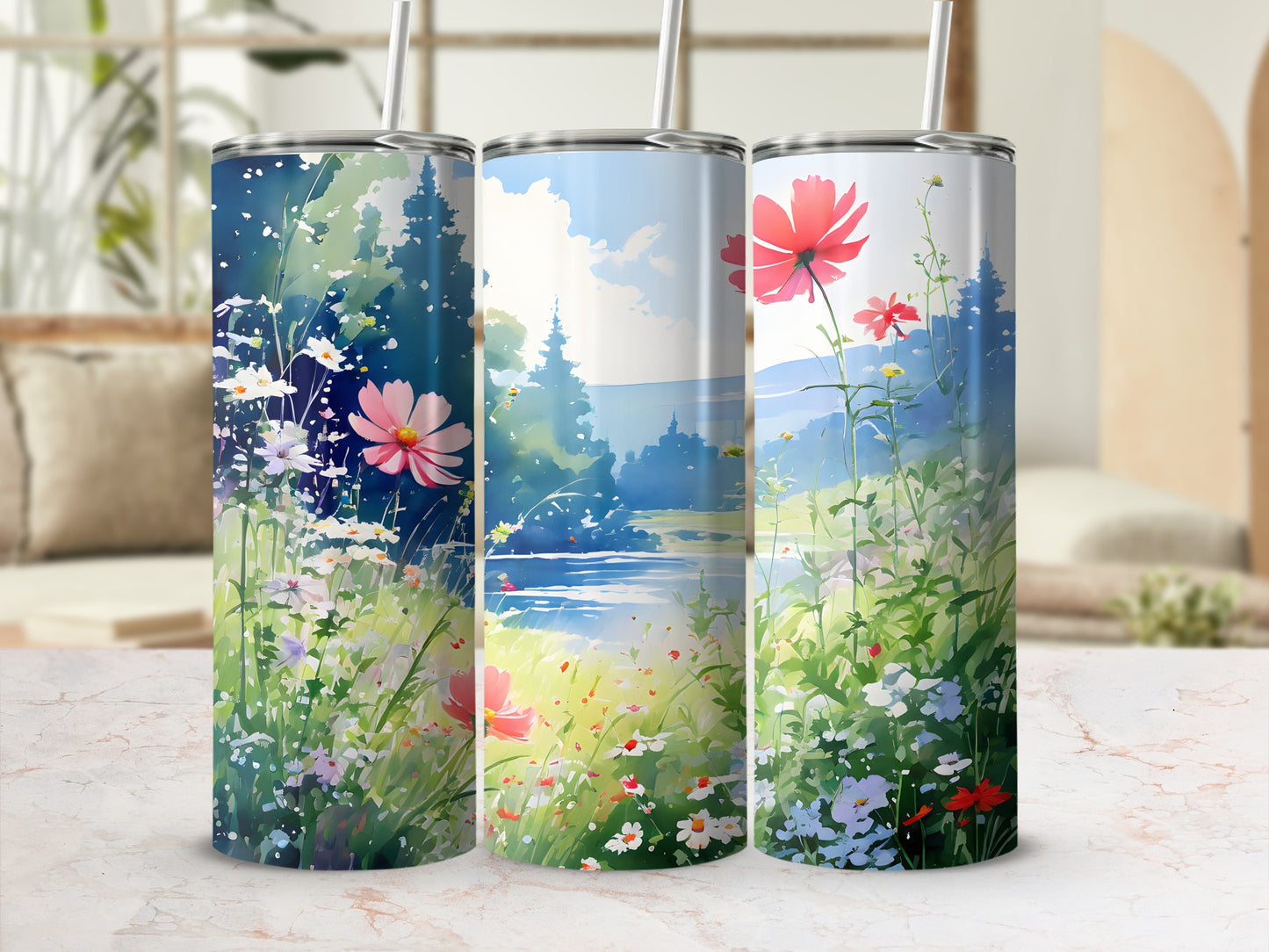 Watercolor floral wildflowers and river landscape on three tumblers.