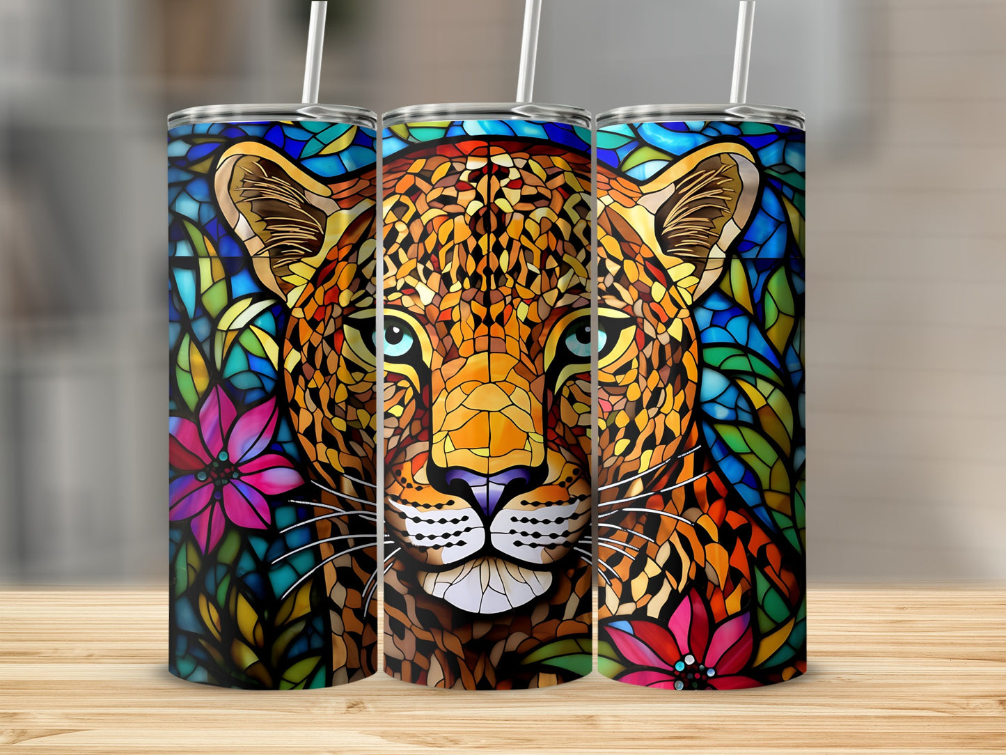 Stained glass tumbler with a leopard's face and floral accents.