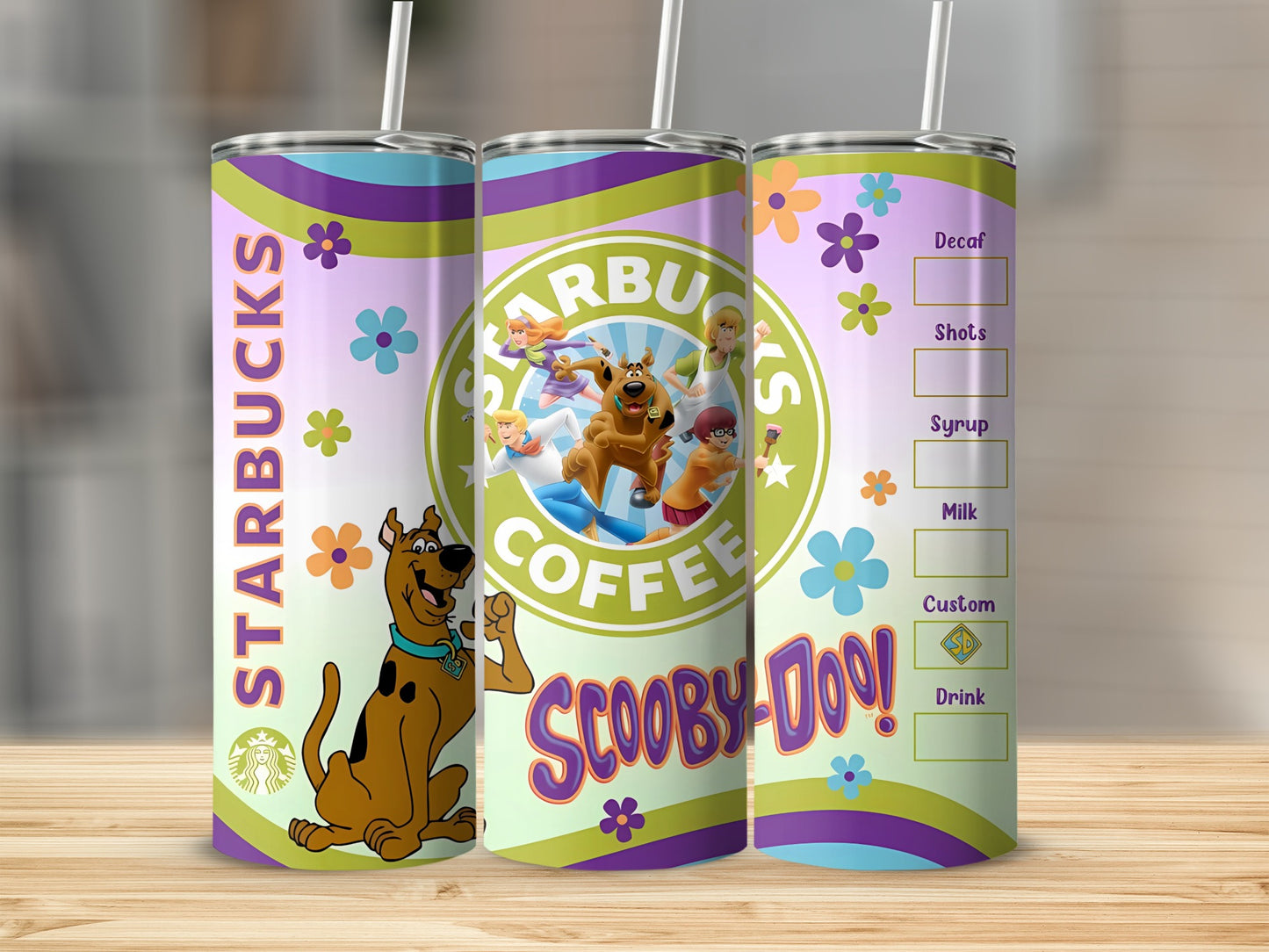 Starbucks Scooby-Doo tumbler with character art and coffee drink options.
