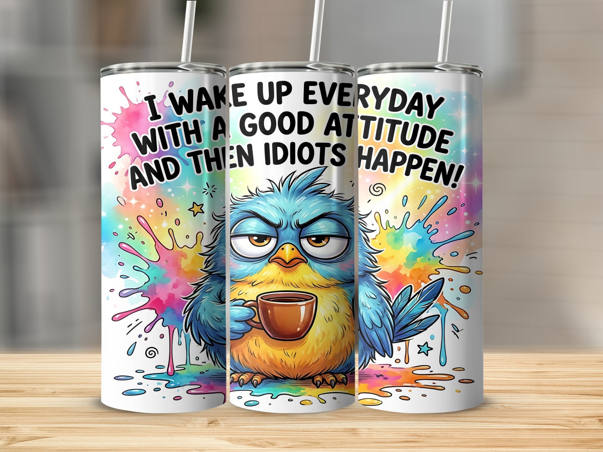 Grumpy blue bird with coffee mug and text "I wake up everyday with a good attitude and then idiots happen!".