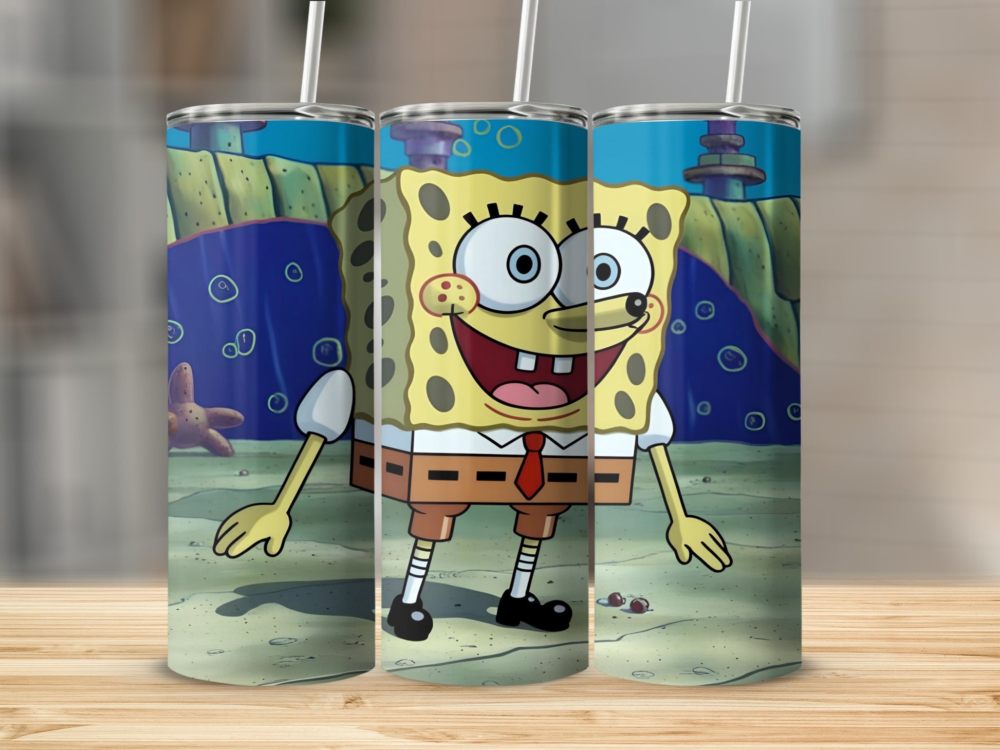 SpongeBob SquarePants cartoon character on a blue tumbler with a straw.