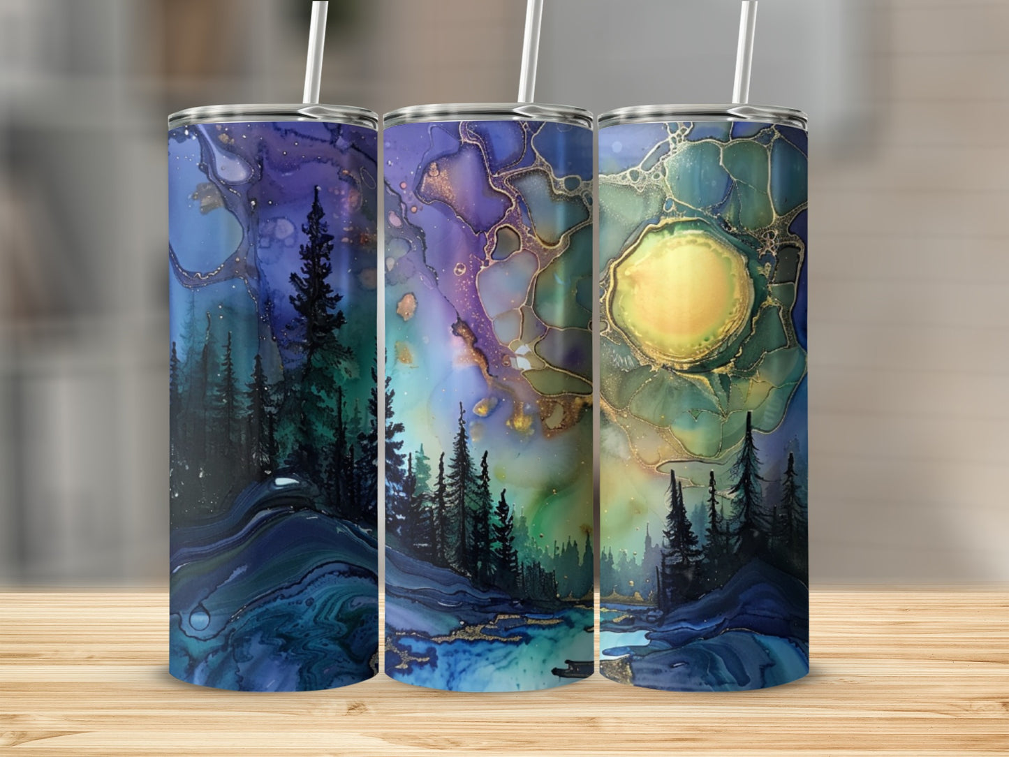Three tumblers with abstract forest and moon landscape designs.