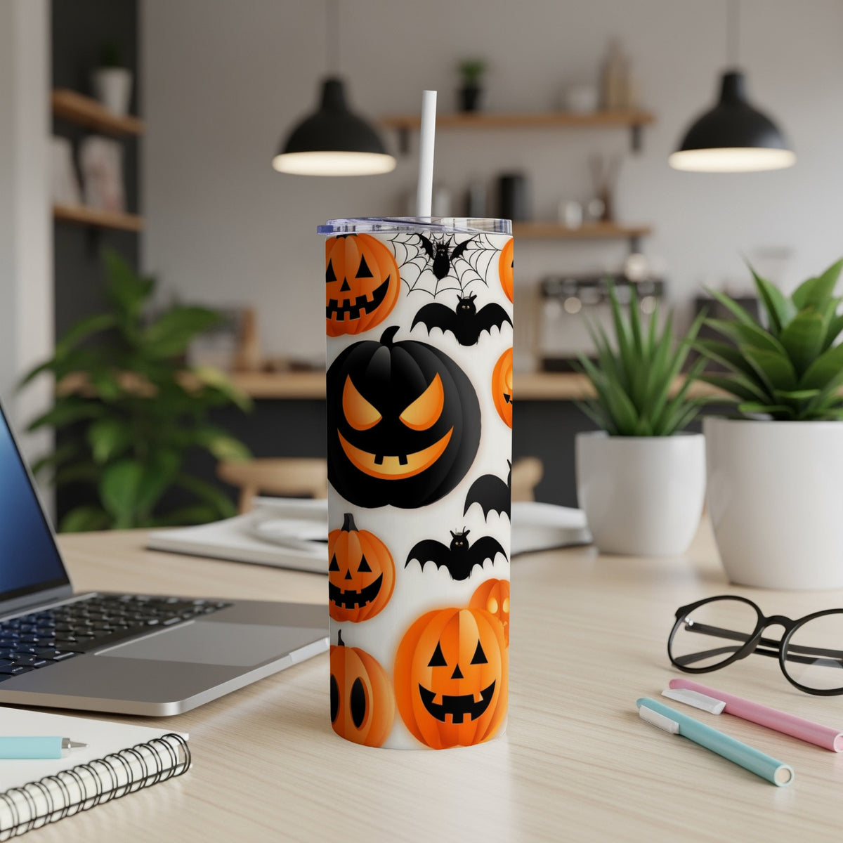 Tall tumbler with a Halloween pattern of jack-o'-lanterns and bats.