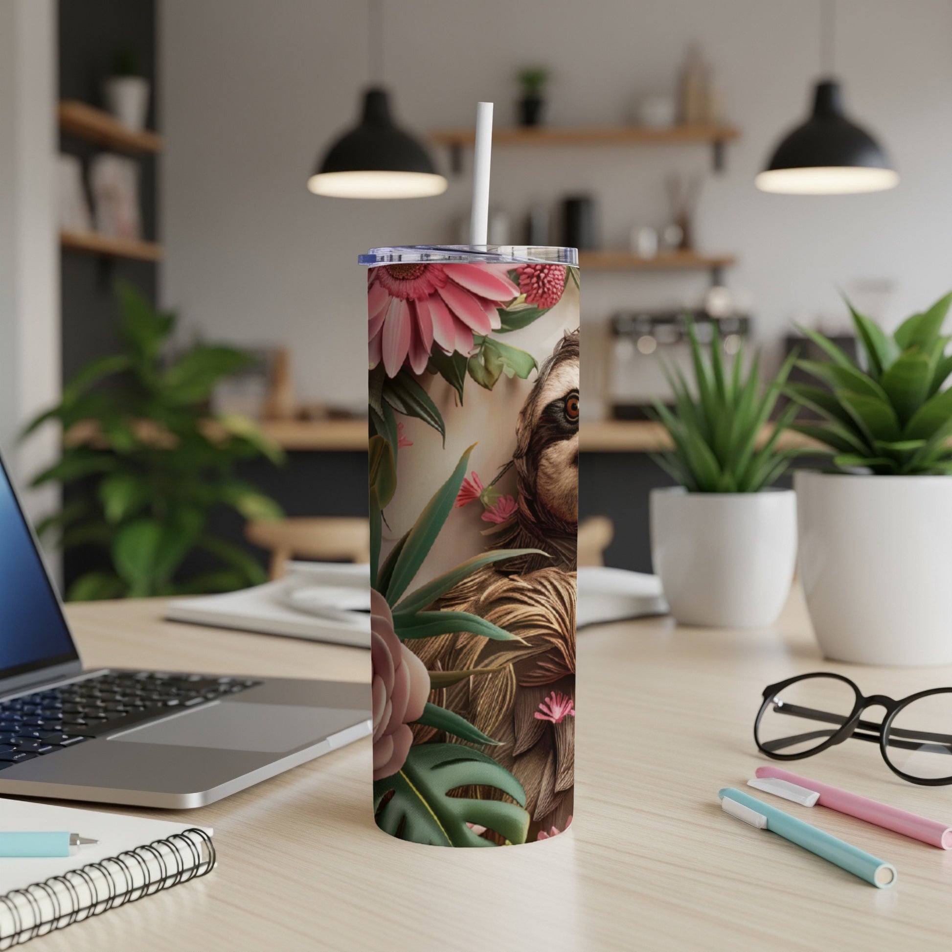 Sloth face with tropical flowers and leaves on a white tumbler.