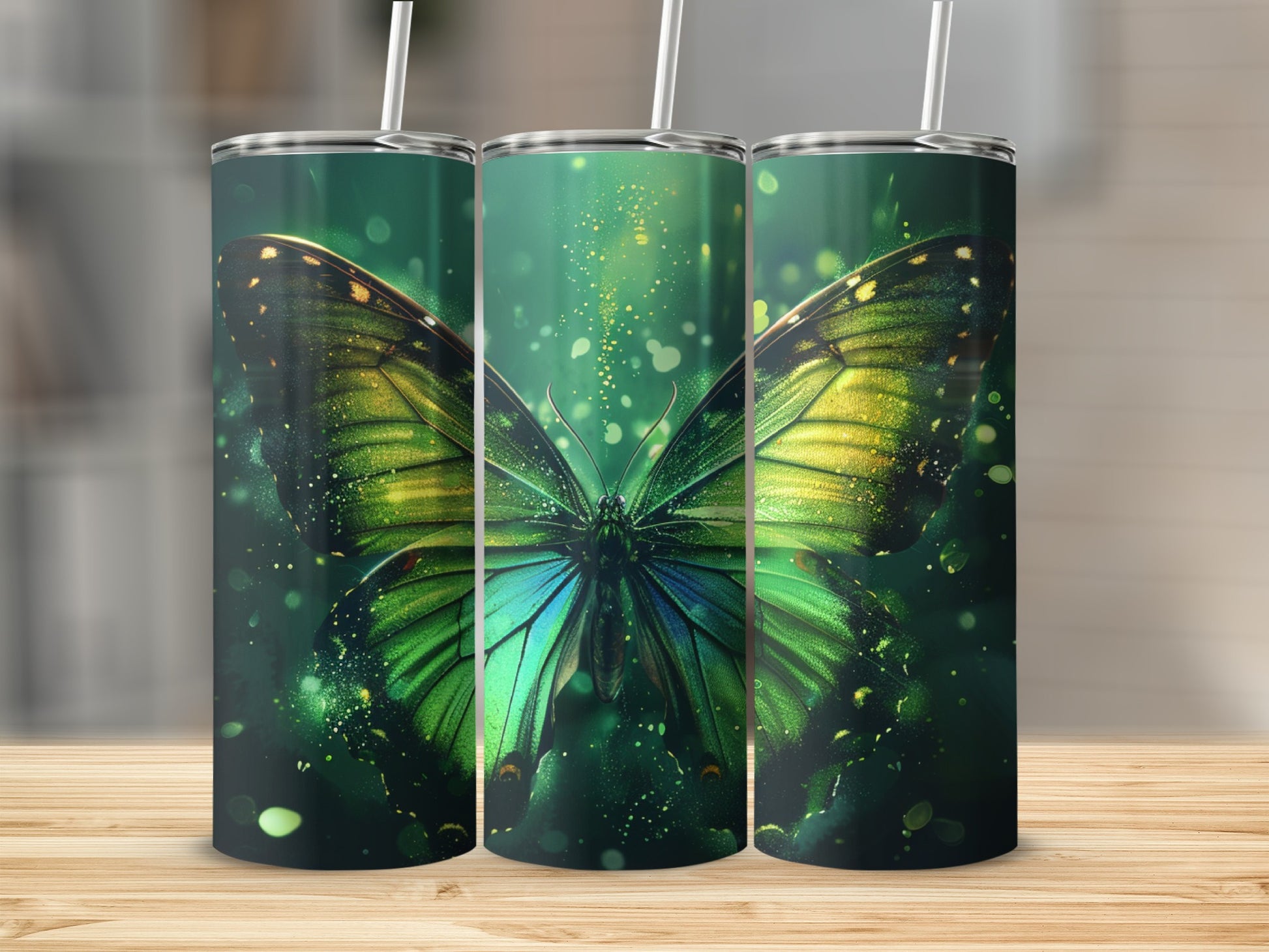 Three tumblers with a vibrant green butterfly design.