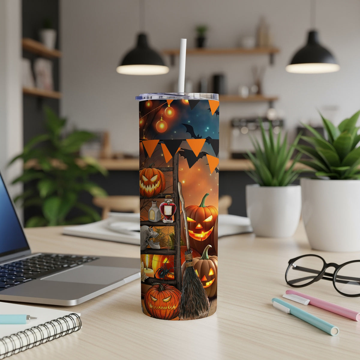 Halloween tumbler with jack-o'-lanterns, bats, and glowing lights design.