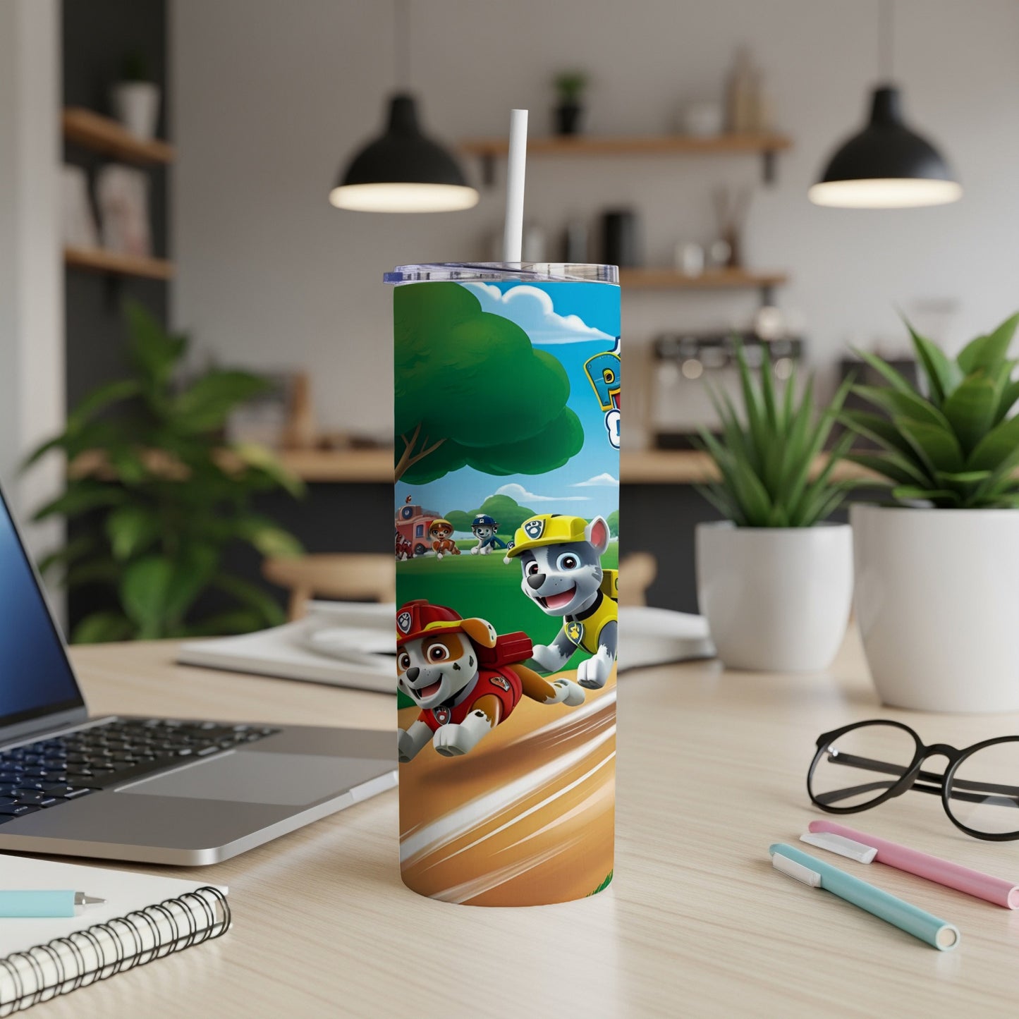 Paw Patrol characters Chase and Marshall running on a colorful cylindrical tumbler.