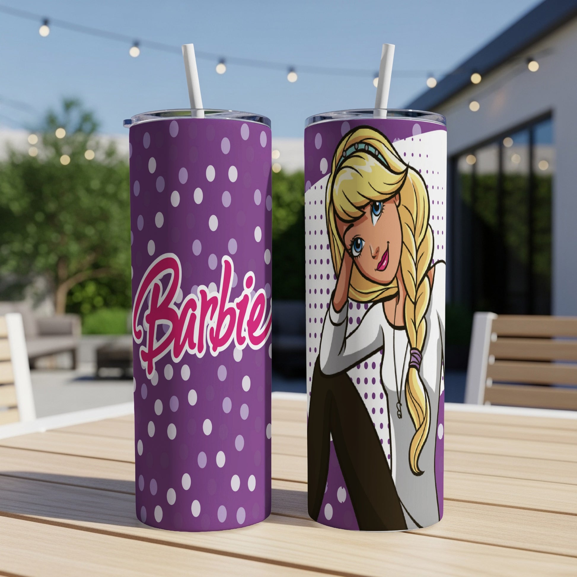 Barbie tumbler with polka dots and a portrait of Barbie.