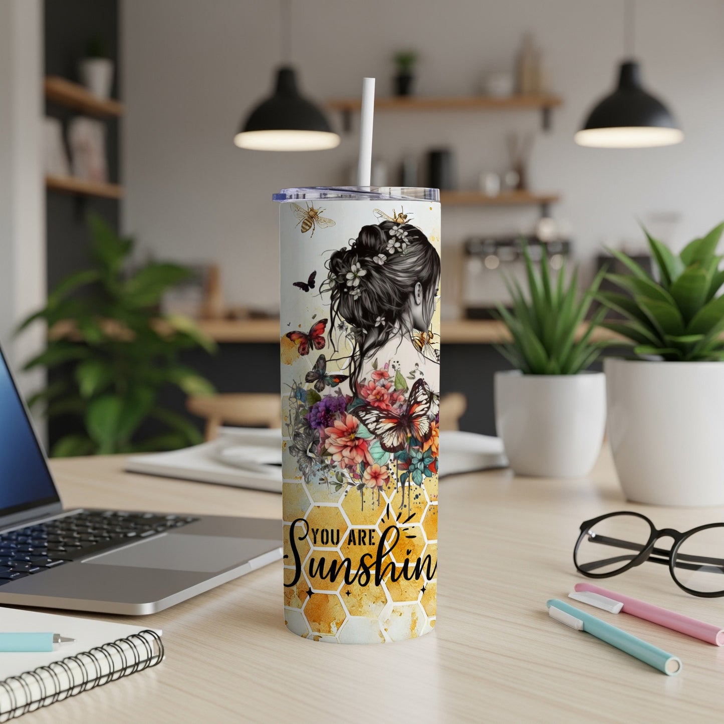 Tumbler with floral design, bees, butterflies, and "You are sunshine" text.
