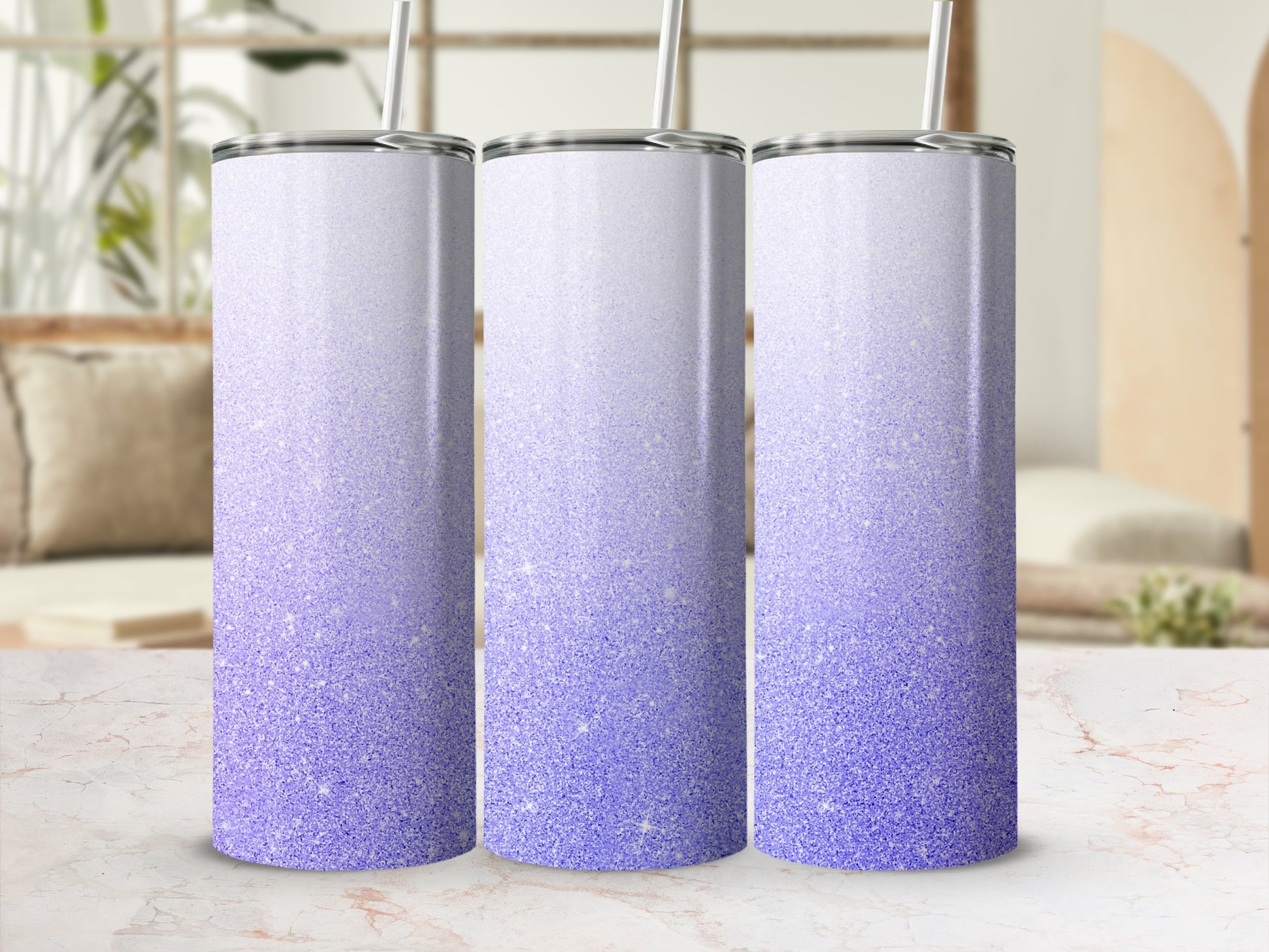 Three tall tumblers with a gradient of purple glitter.