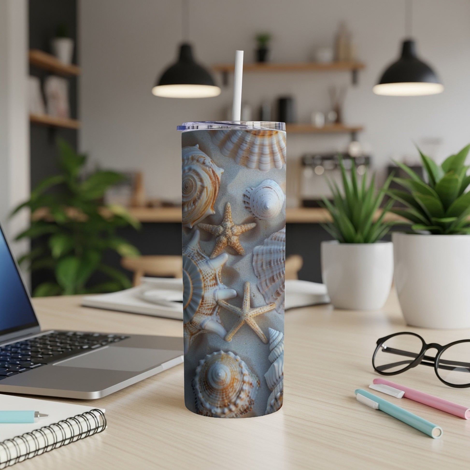 Seashells and starfishes pattern on a white tumbler with a straw.