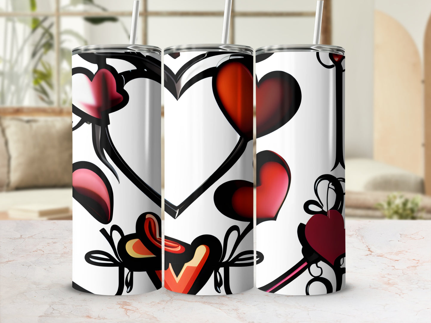 Three tumblers with a black outlined heart pattern and red accents.