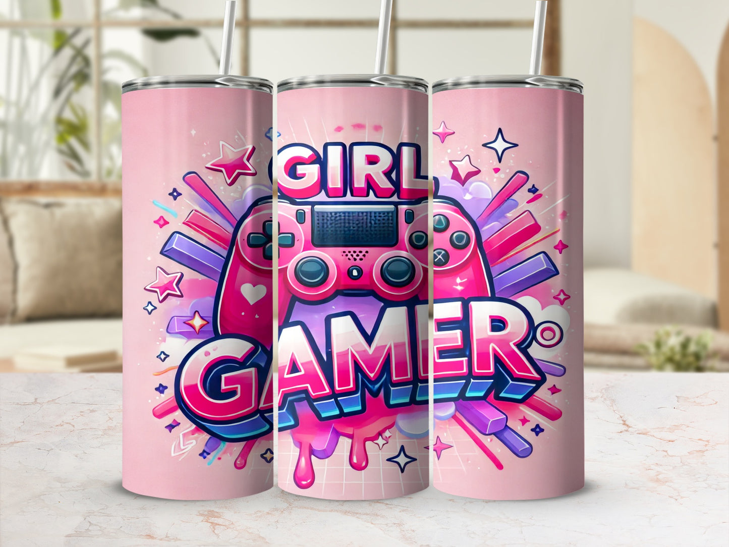 Pink tumbler with "Gamer Girl" text and game controller graphic.