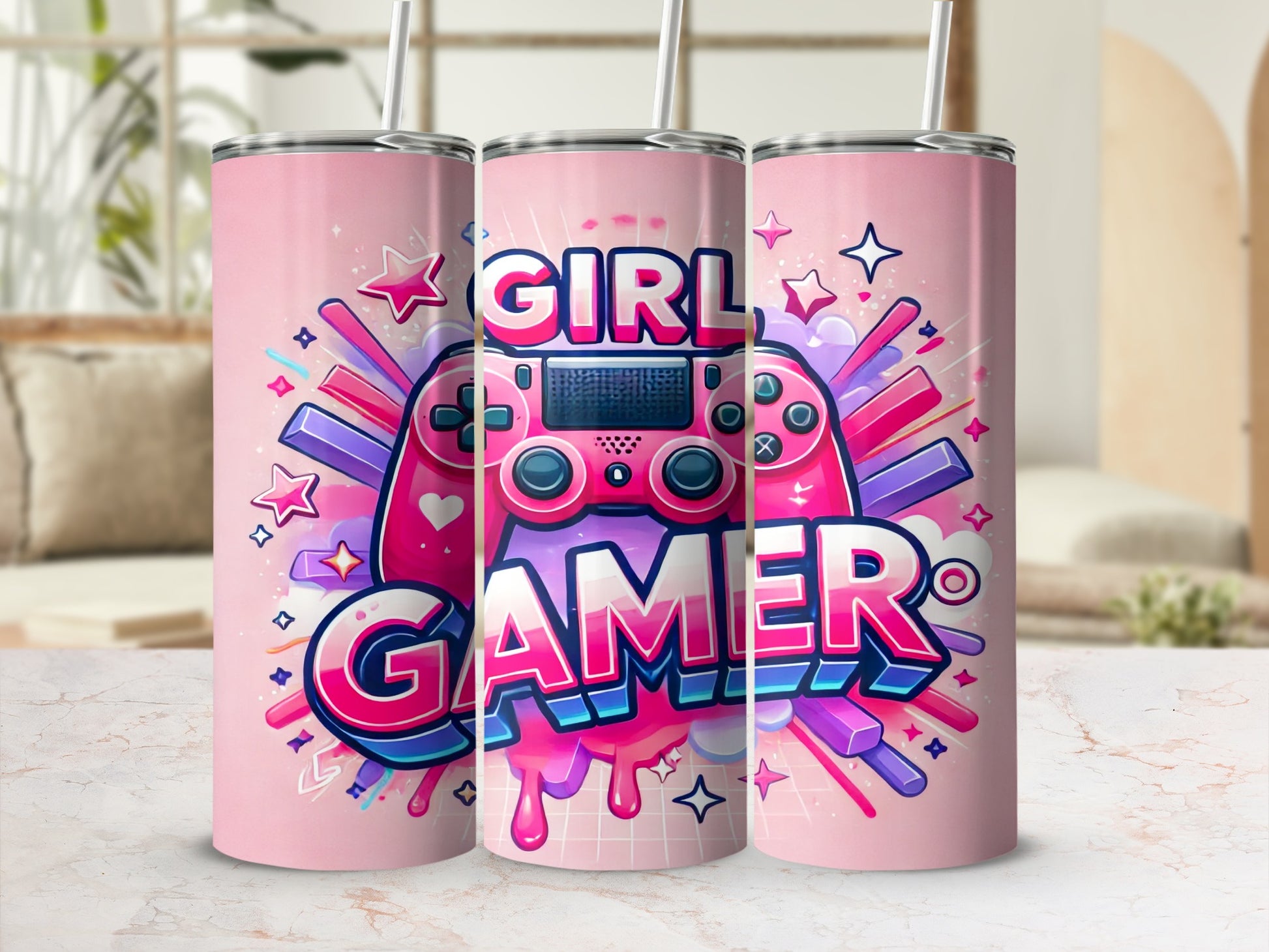Pink tumbler with "Gamer Girl" text and game controller graphic.